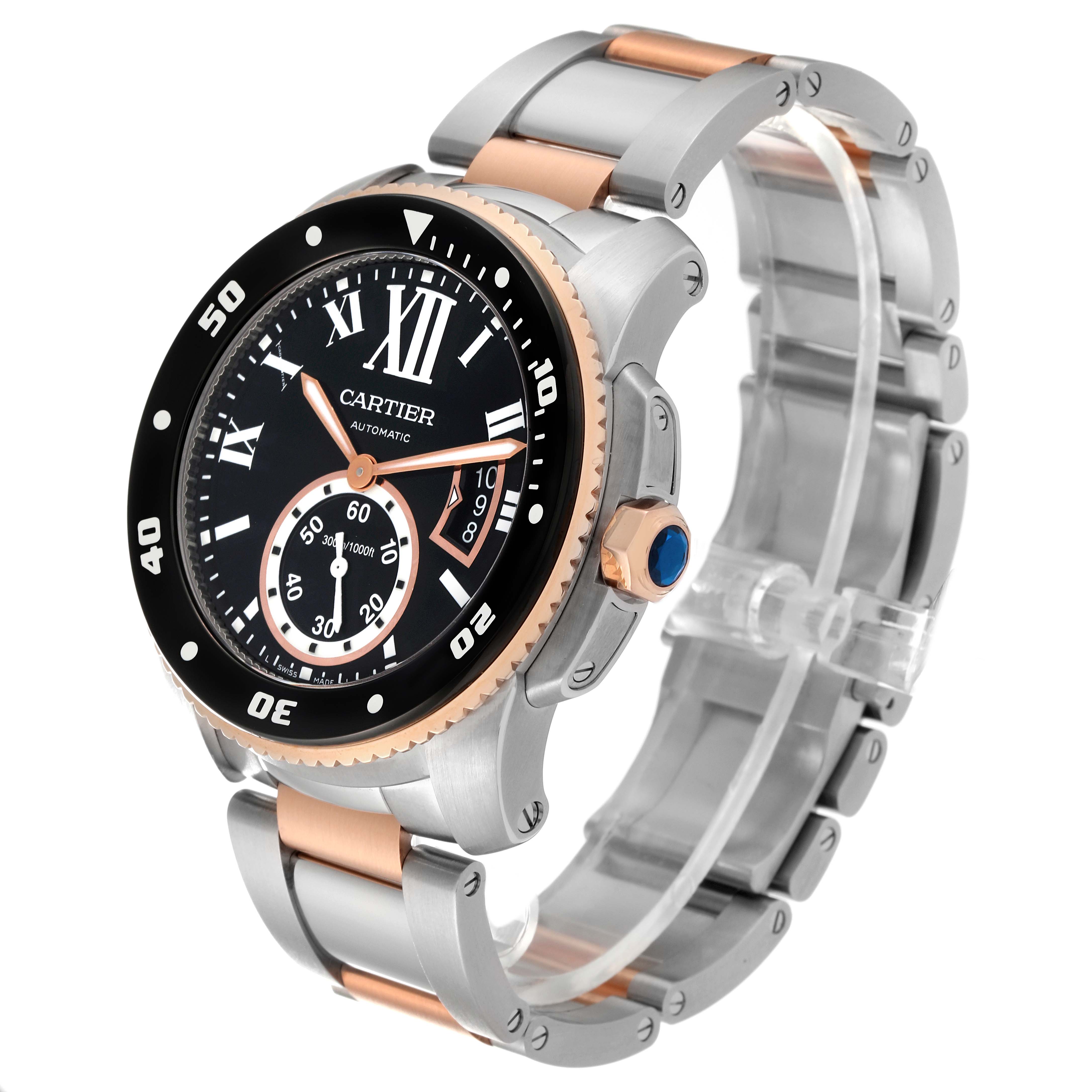 The image shows a Calibre de Cartier watch by Cartier from an angled side view, highlighting the dial, bezel, crown, and two-tone bracelet.