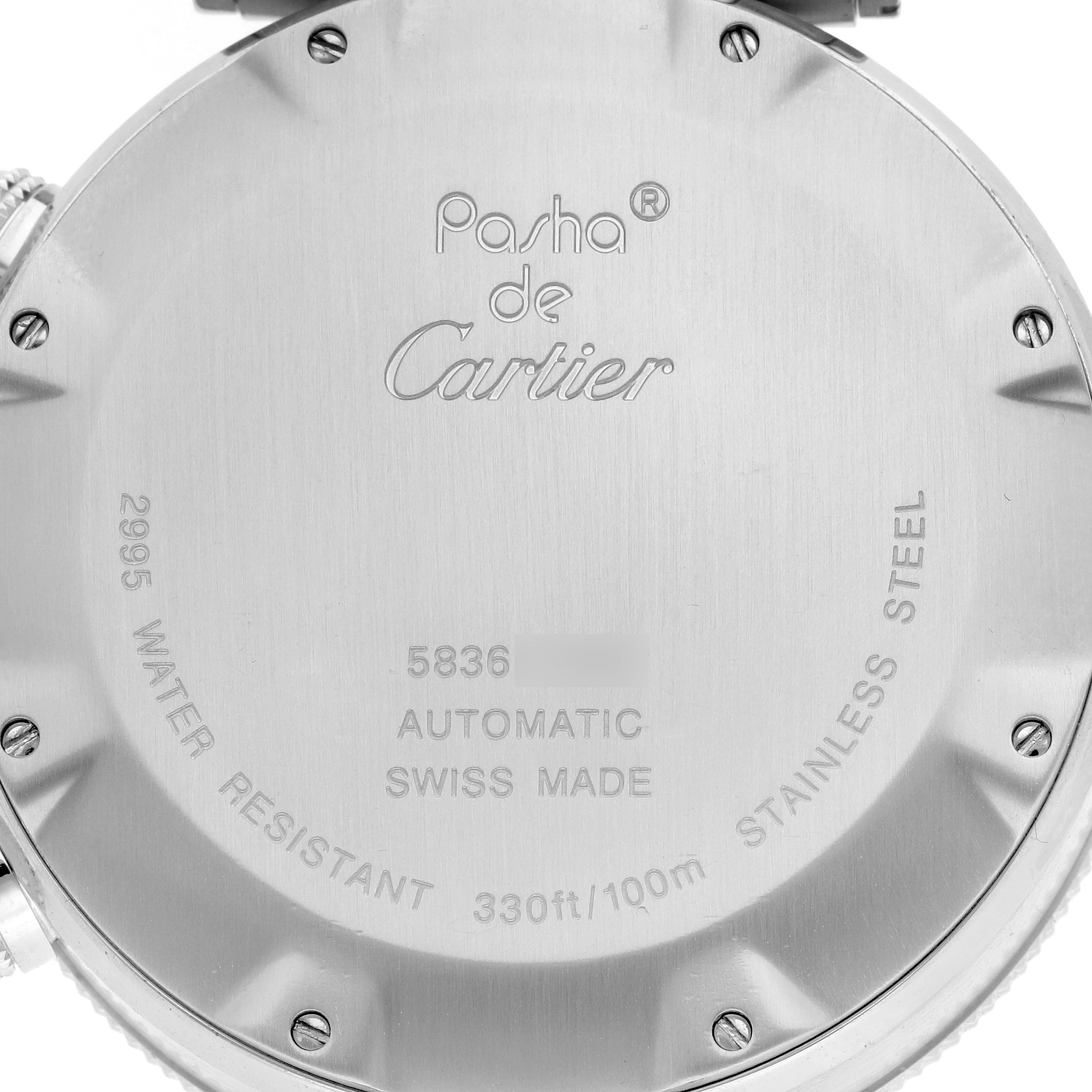 The image shows the back case of a Cartier Pasha W31089M7 Men's Stainless Steel Silver Dial W31089M7 Men's Stainless Steel Silver Dial watch, highlighting its engravings and screws.
