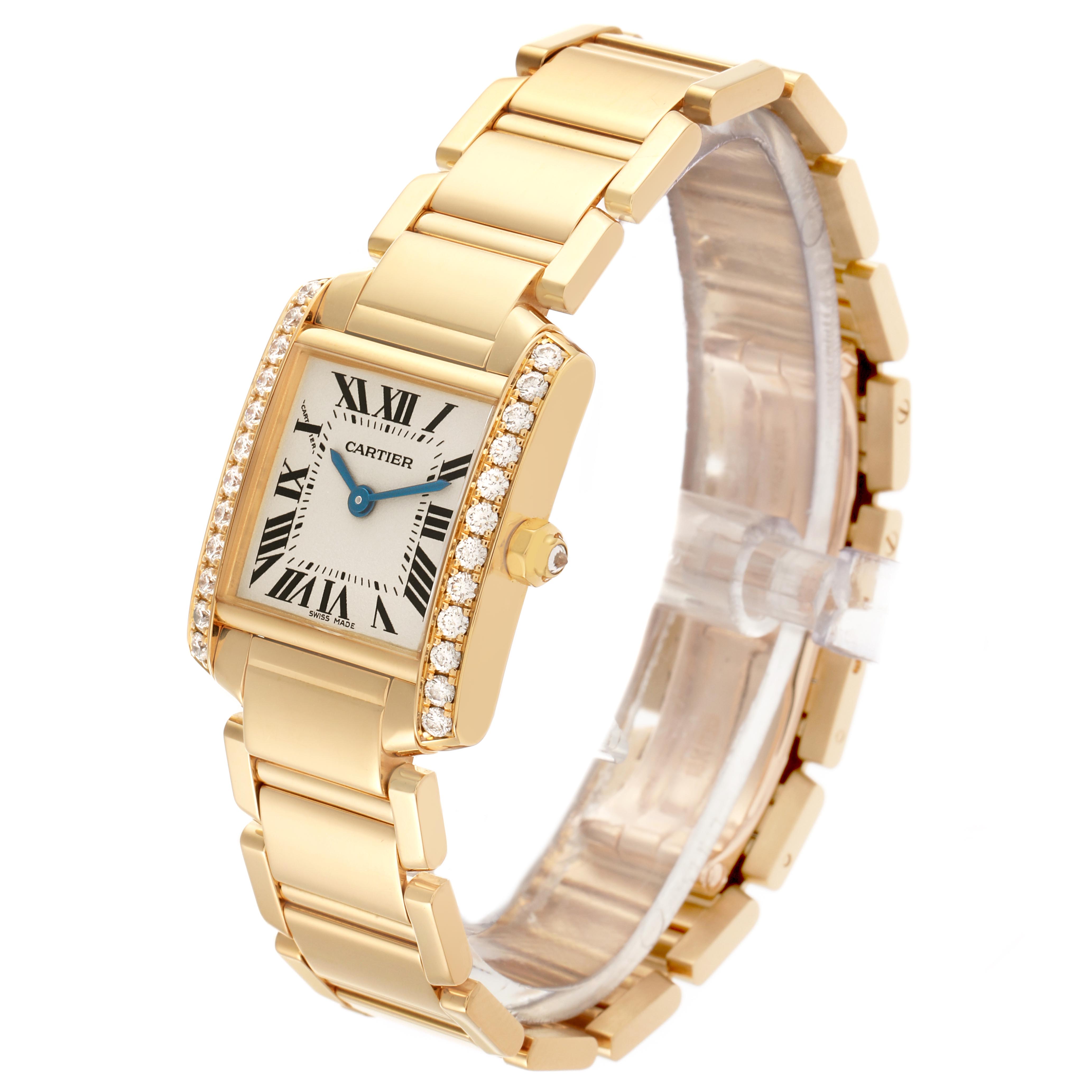 The Cartier Tank Francaise WE1001R8 Women's Yellow Gold Silver Dial WE1001R8 Women's Yellow Gold Silver Dial watch is shown at a three-quarter angle, highlighting the face, bracelet, and diamond details.