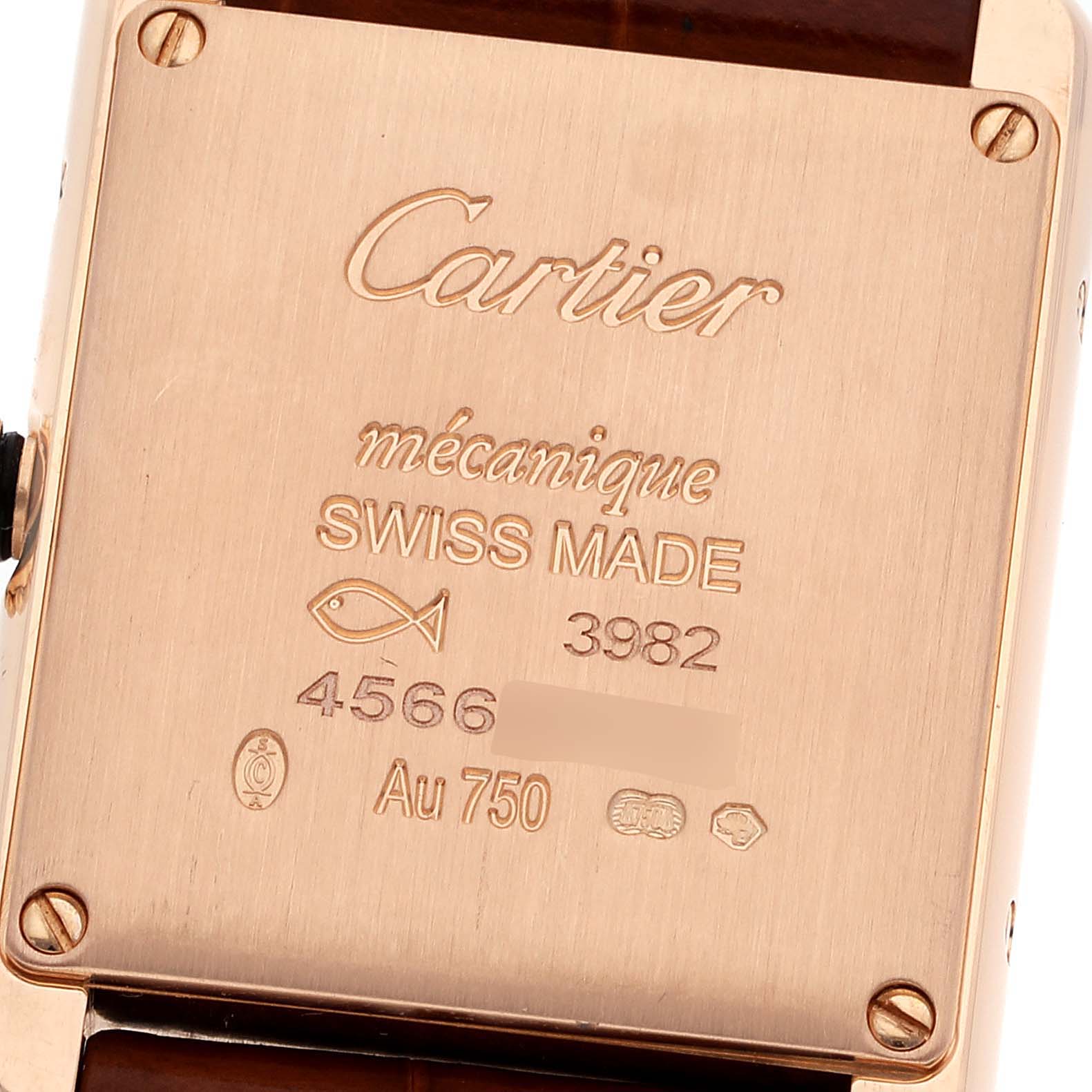 This is the back case of the Cartier Tank Louis WGTA0010 Women's Rose Gold Silver Dial WGTA0010 Women's Rose Gold Silver Dial watch, showing engravings and screws.