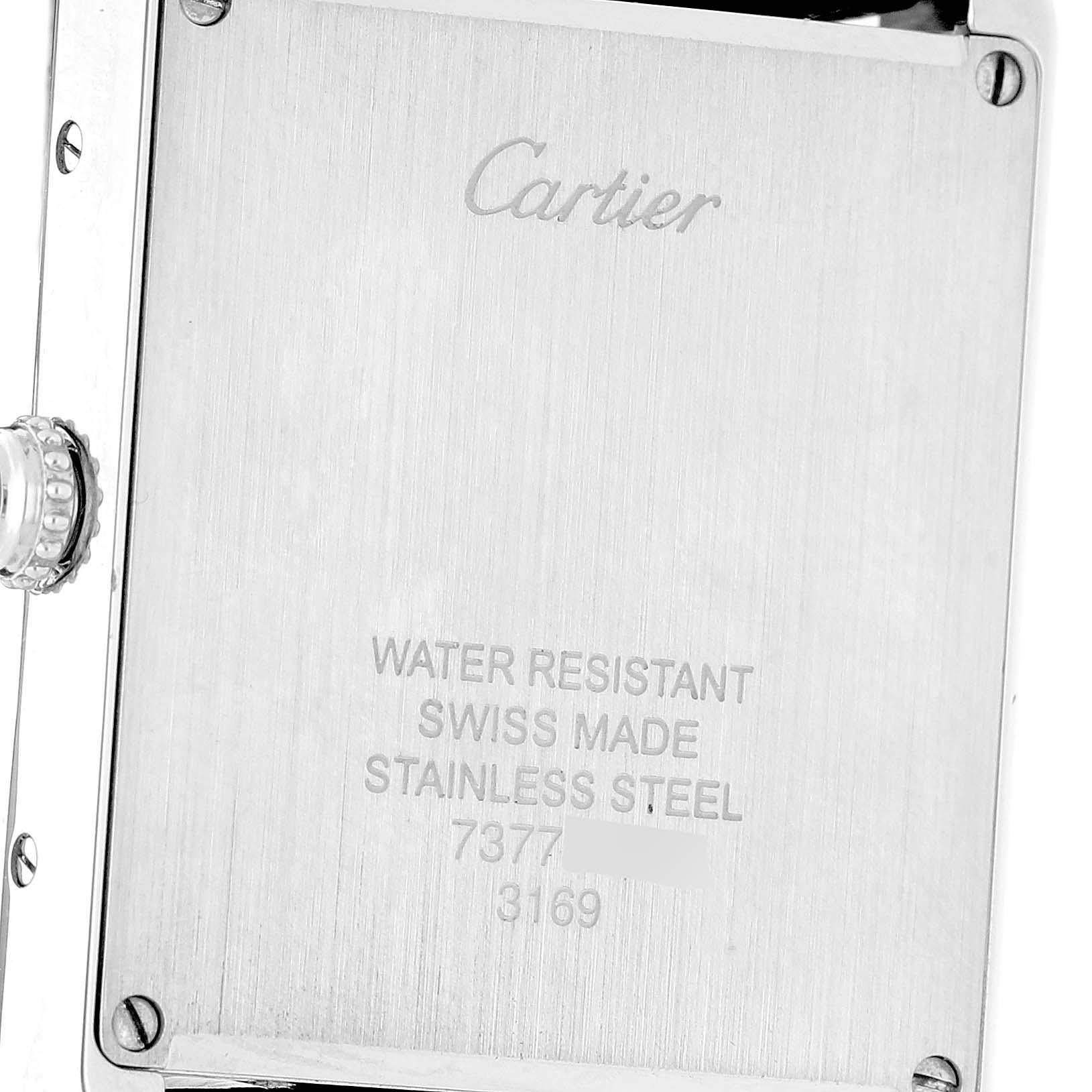 The image shows the back of a Cartier Tank Solo W5200003 Men's Stainless Steel Silver Dial watch, highlighting the case back and crown.