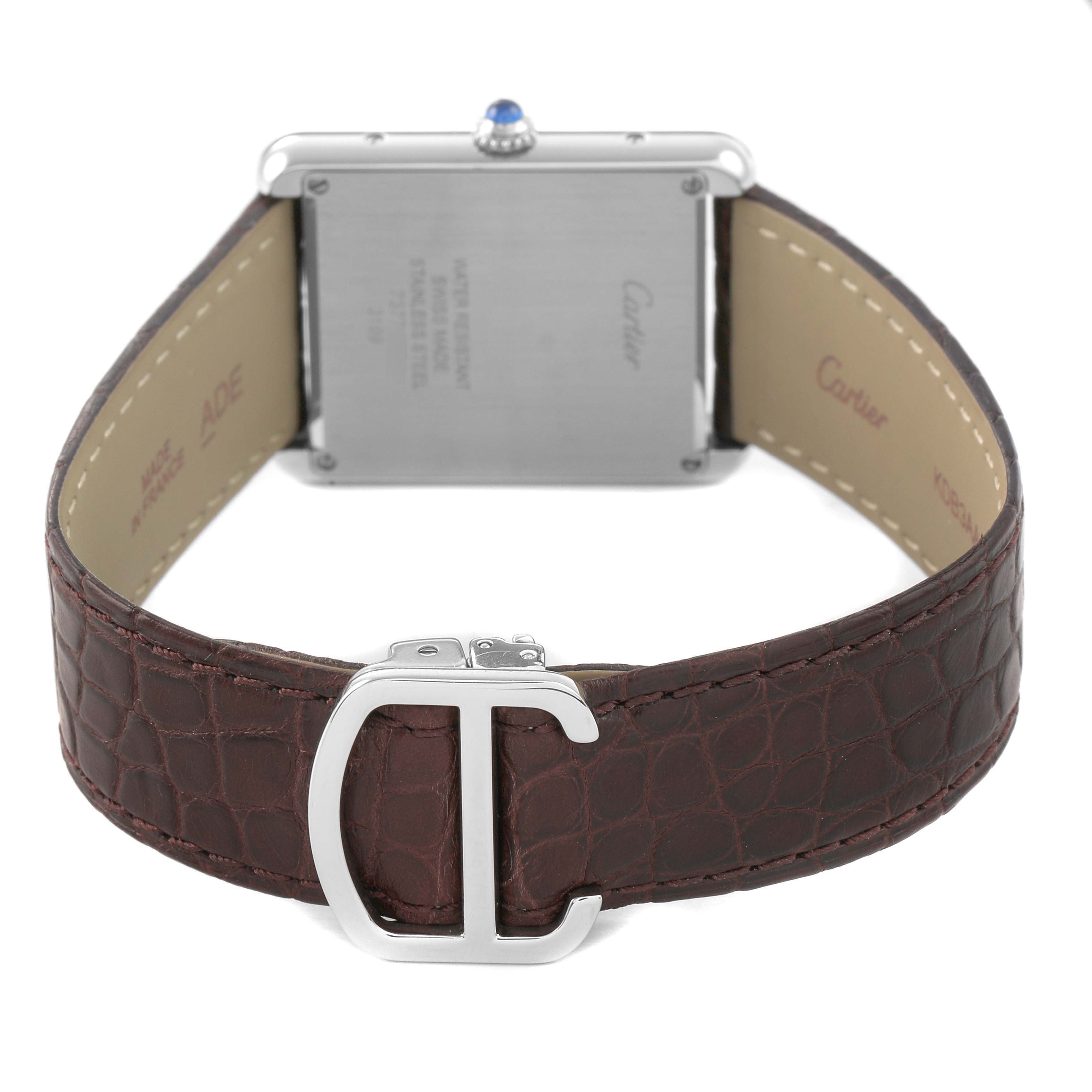 The image shows the back view of a Cartier Tank Solo W5200003 Men's Stainless Steel Silver Dial watch, highlighting the case back, strap, and clasp.