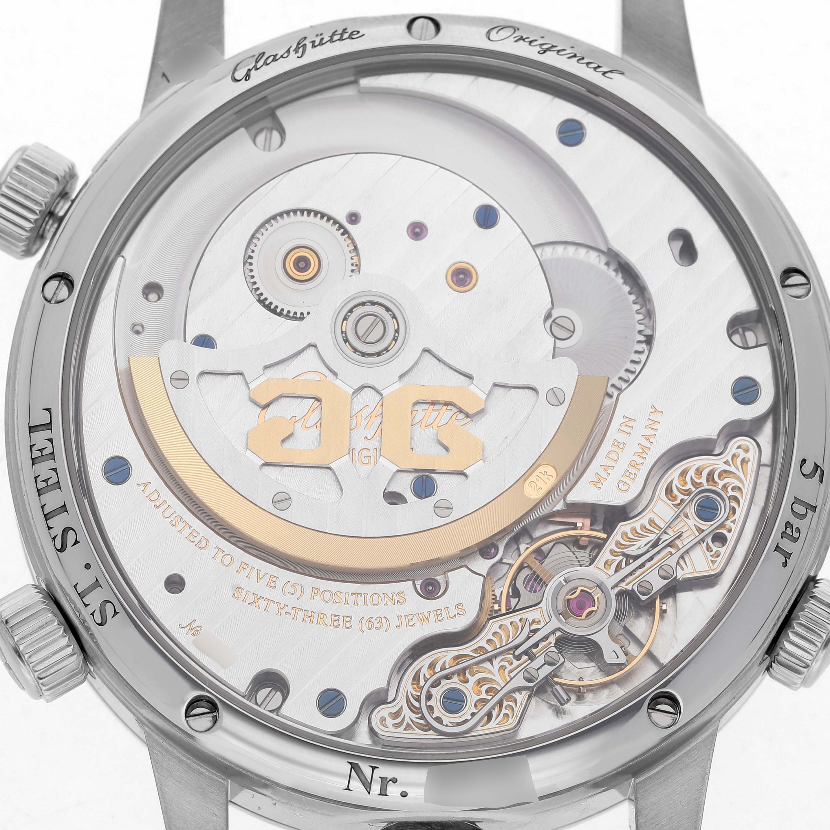 The image shows the back view of a Glashütte Original model, highlighting the intricate movement and internal mechanics.