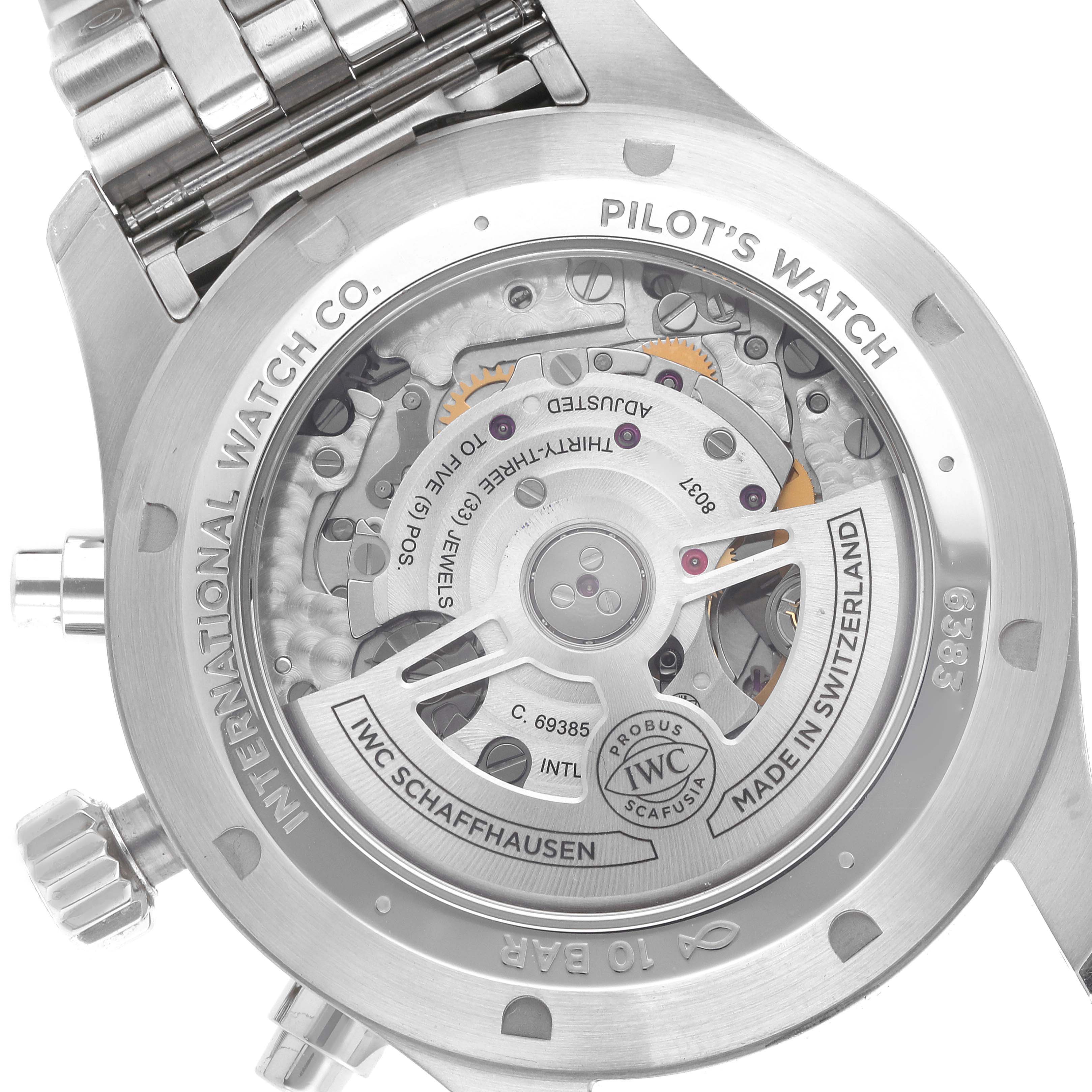 The image shows the back case of an IWC Pilot IW378004 Men's Stainless Steel Blue Dial IW378004 Men's Stainless Steel Blue Dial model watch with an exhibition view of the movement.