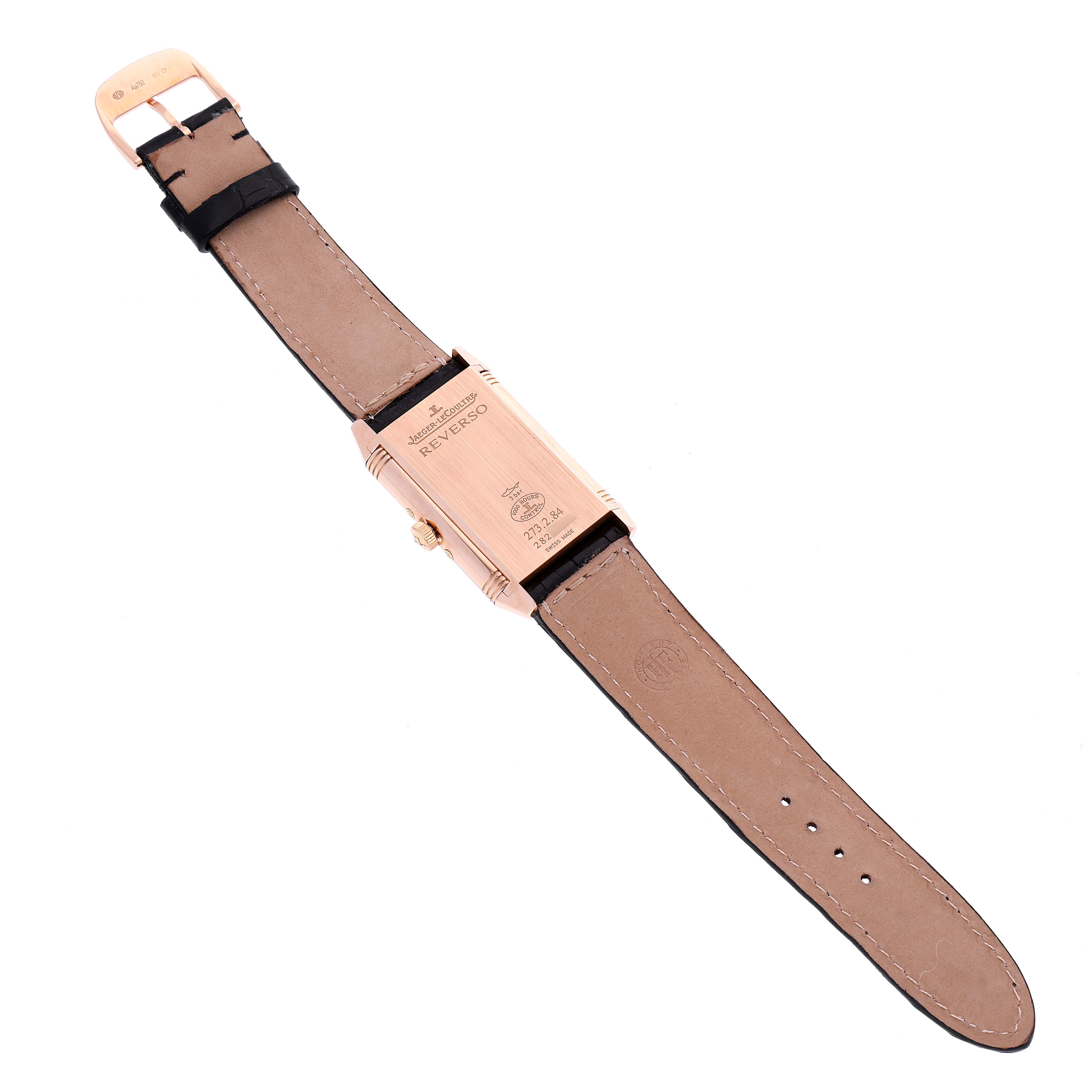The image shows the back of a Jaeger LeCoultre Reverso Q3752520 Men
s Rose Gold Silver Dial Q3752520 Men
s Rose Gold Silver Dial watch, including its rectangular case, crown, and leather strap, viewed from above.