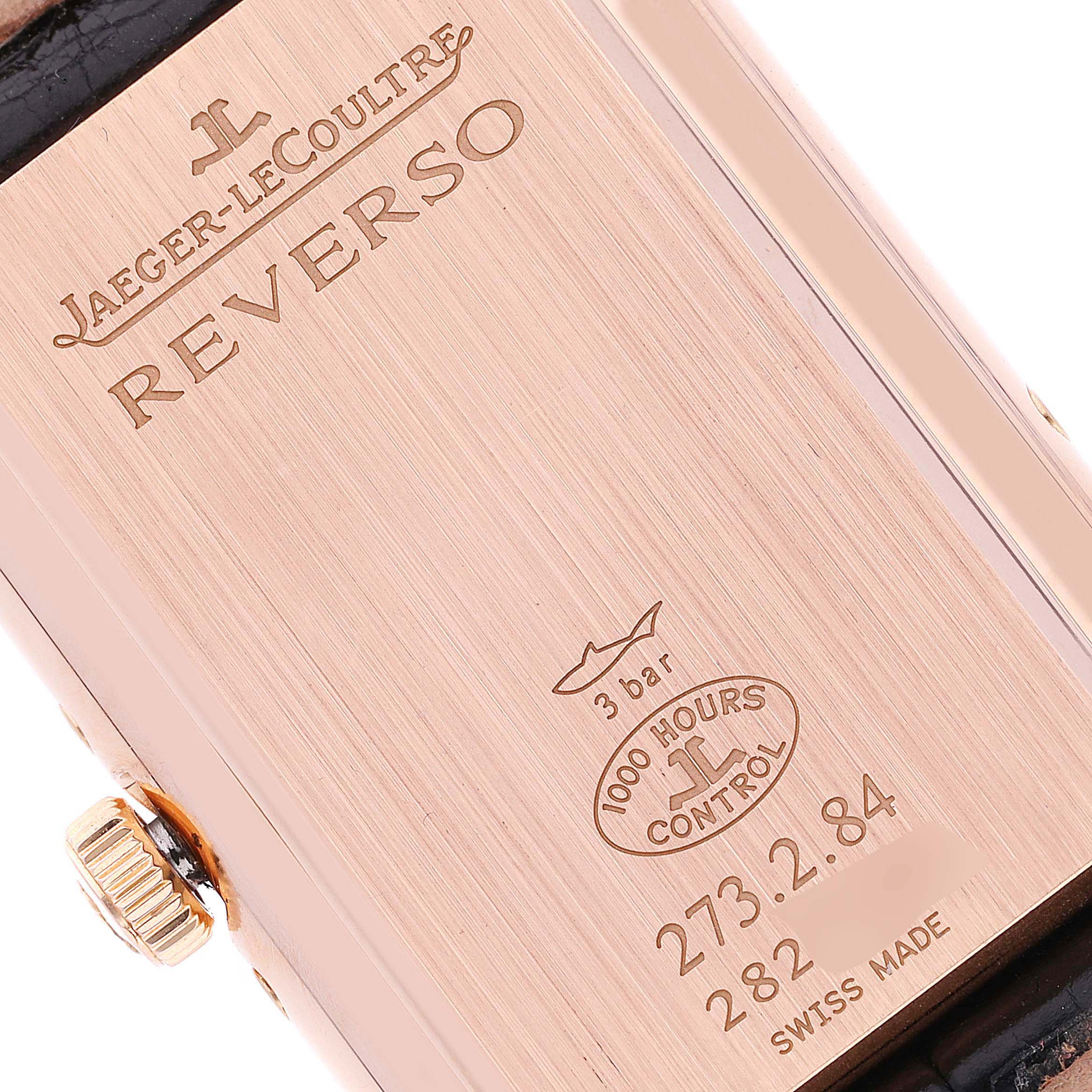 This image shows the back of the Jaeger LeCoultre Reverso Q3752520 Men
s Rose Gold Silver Dial Q3752520 Men
s Rose Gold Silver Dial watch with details about its water resistance and manufacturing.