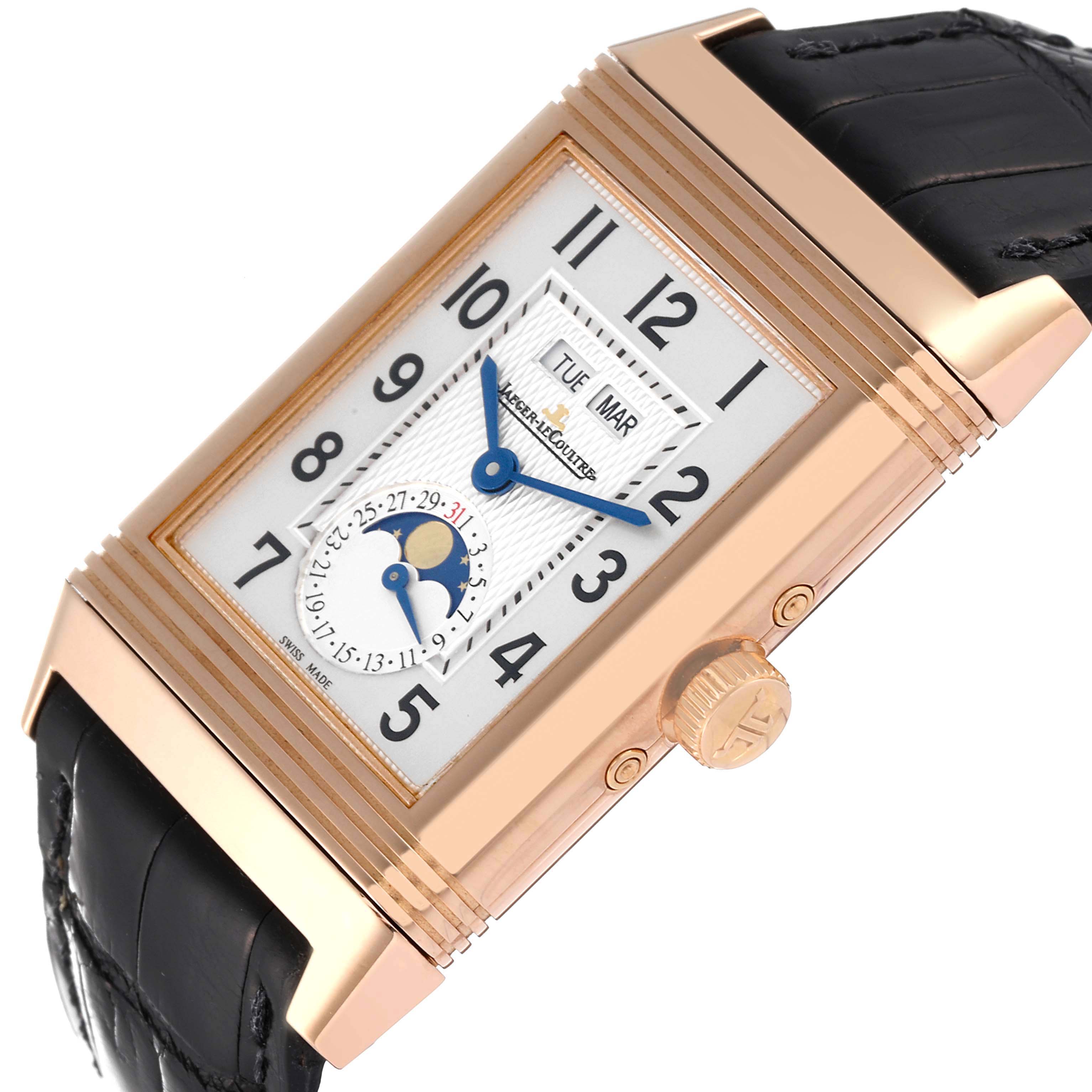 The image shows a side perspective of a Jaeger LeCoultre Reverso Q3752520 Men
s Rose Gold Silver Dial Q3752520 Men
s Rose Gold Silver Dial watch, highlighting the crown, case details, and part of the strap.