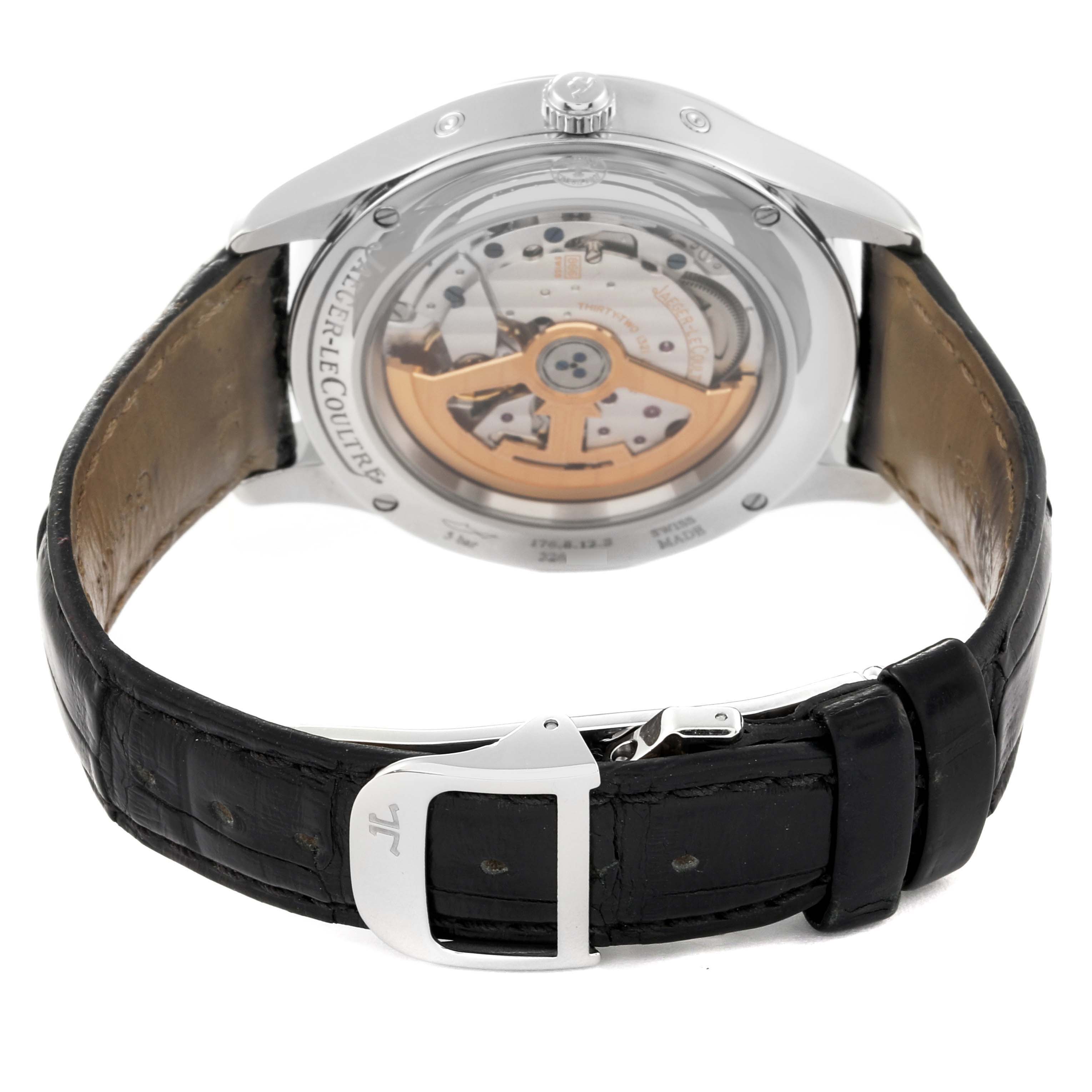 The image shows the back view of the Jaeger-LeCoultre Master model watch, highlighting its open case back and black leather strap.