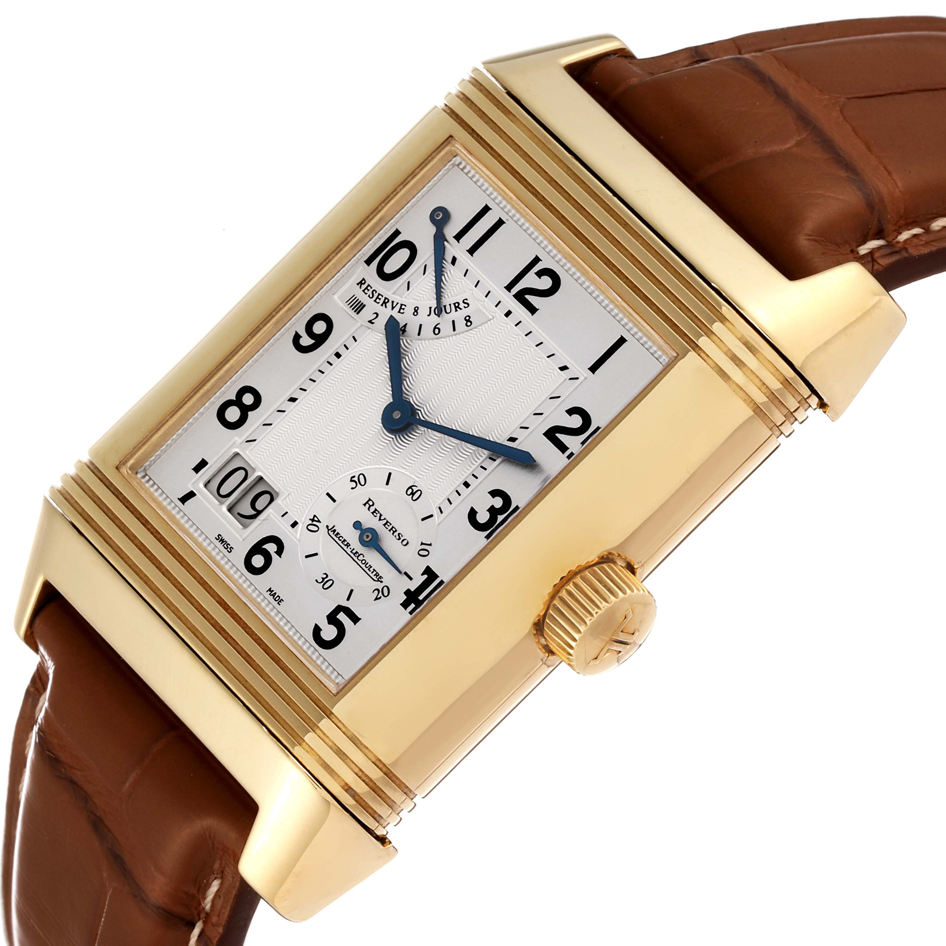 This image shows a close-up of the Jaeger LeCoultre Reverso Q3001420 Men's Yellow Gold Silver Dial Q3001420 Men's Yellow Gold Silver Dial watch, highlighting its dial, casing, and crown.