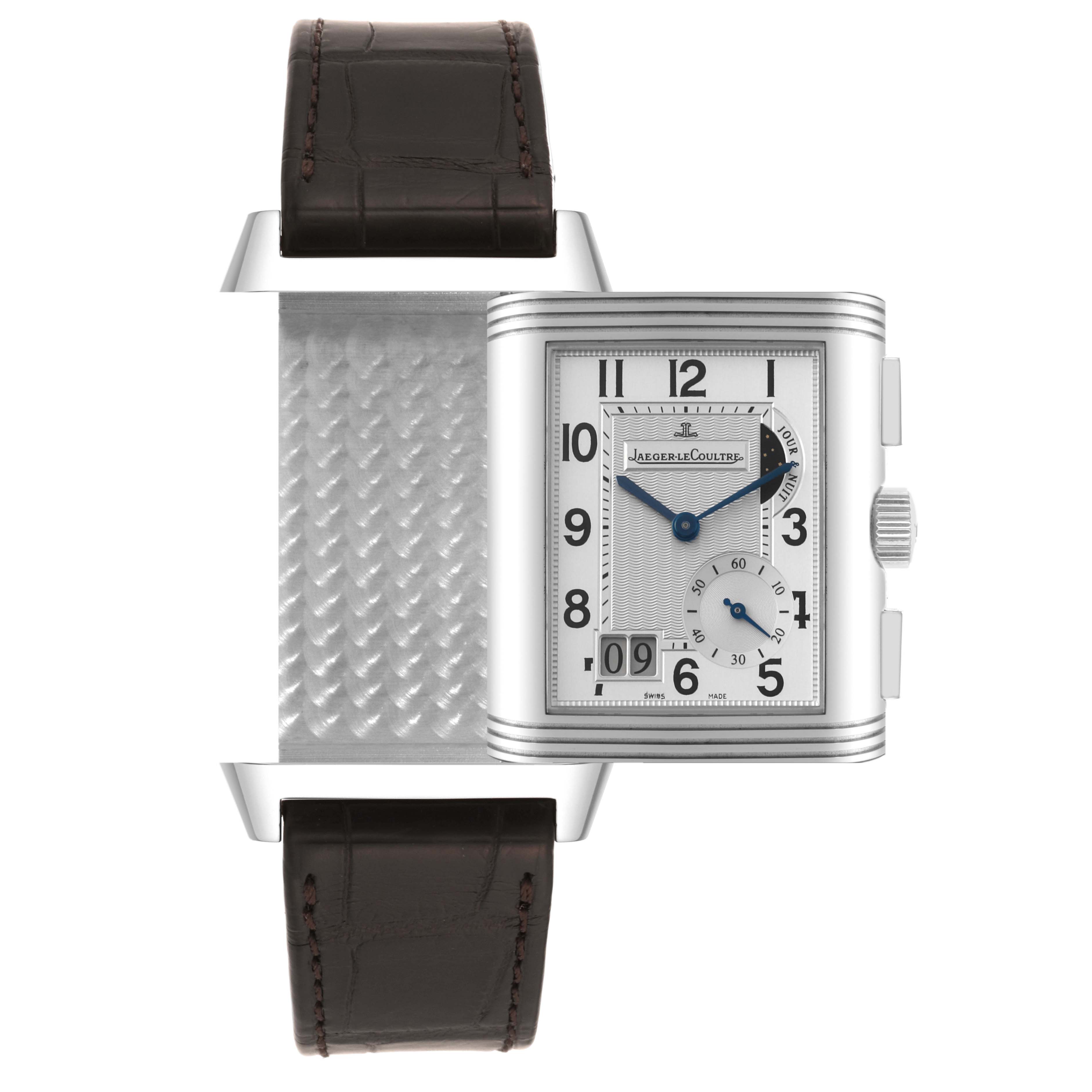 The image shows a front and side view of the Jaeger LeCoultre Reverso Q3028420 Men's Stainless Steel Silver Dial Q3028420 Men's Stainless Steel Silver Dial watch, highlighting its reversible case and leather strap.