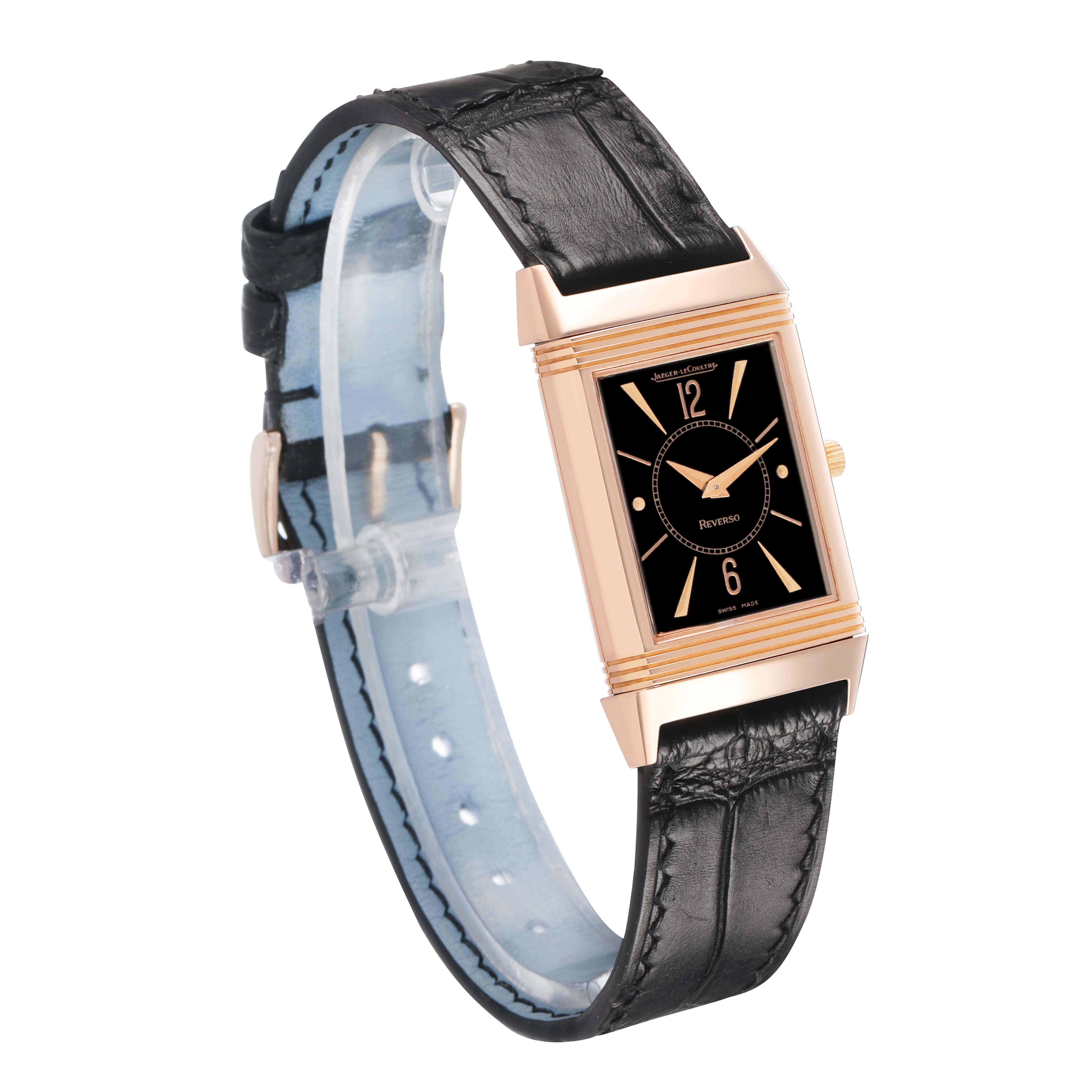 The Jaeger-LeCoultre Reverso model is shown from a front angle, featuring the rectangular case, black dial, and black leather strap.