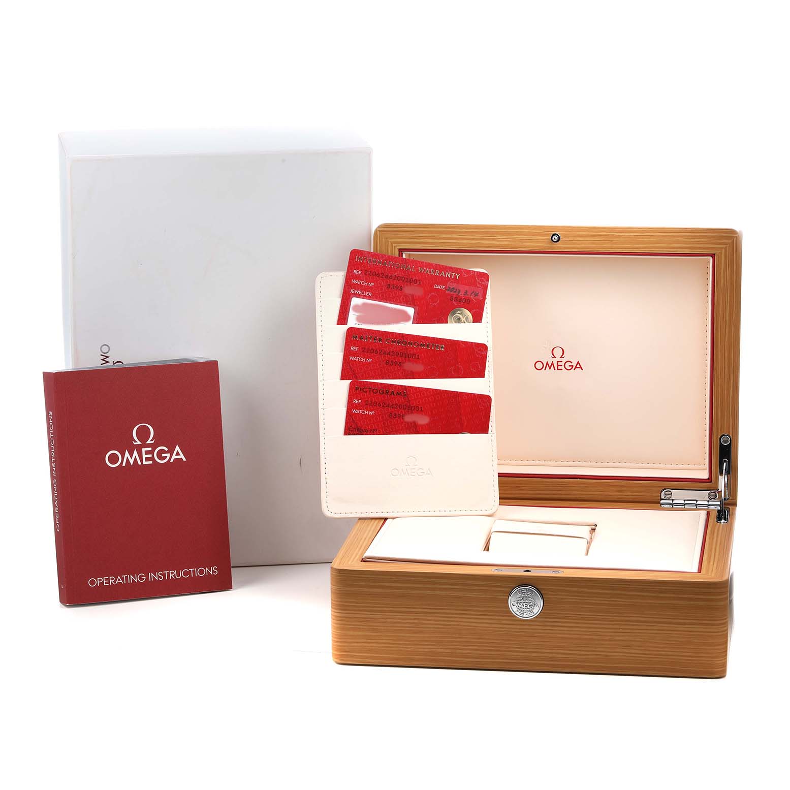 The image shows Omega Seamaster 210.62.44.20.01.001 Men's Ceramic Black Dial accessories including a watch box, warranty cards, and an operating manual.