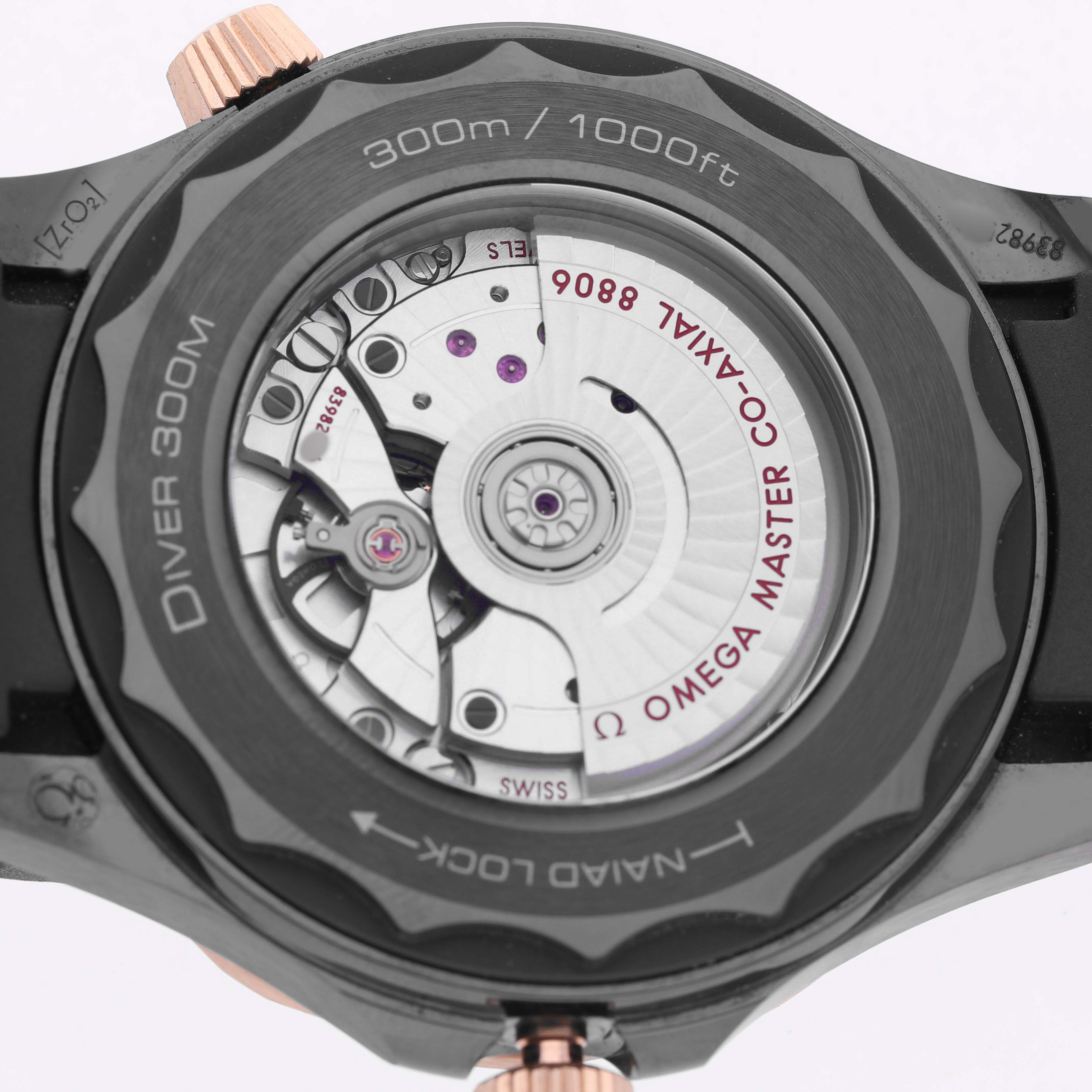 The image shows the Omega Seamaster 210.62.44.20.01.001 Men's Ceramic Black Dial's case back, displaying its movement and "Diver 300M" markings.