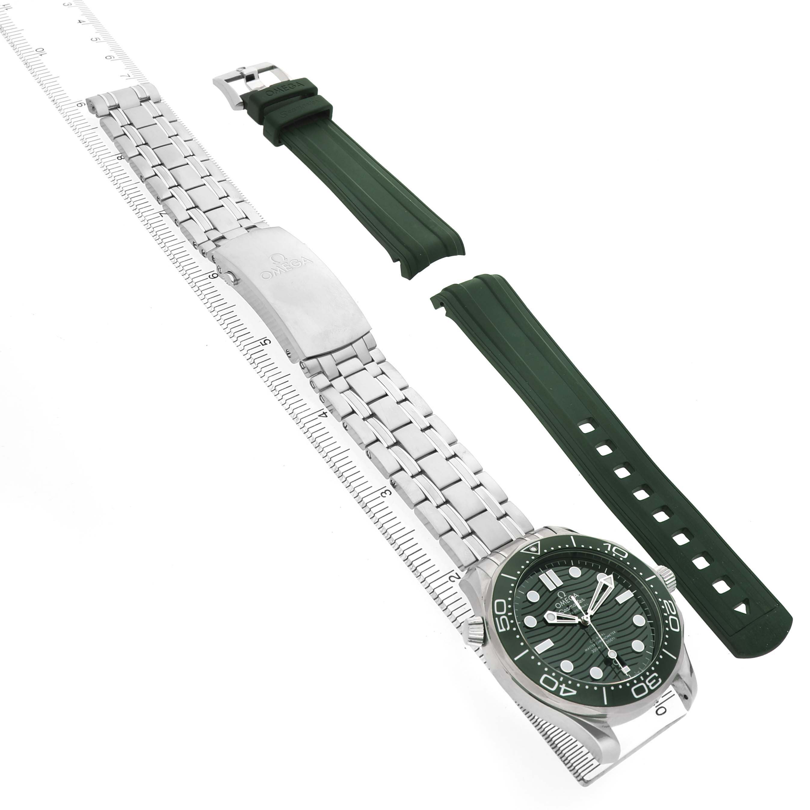 The Omega Seamaster 210.30.42.20.10.001 Men's Stainless Steel Green Dial watch is displayed at an oblique angle with both metal and green rubber straps visible.