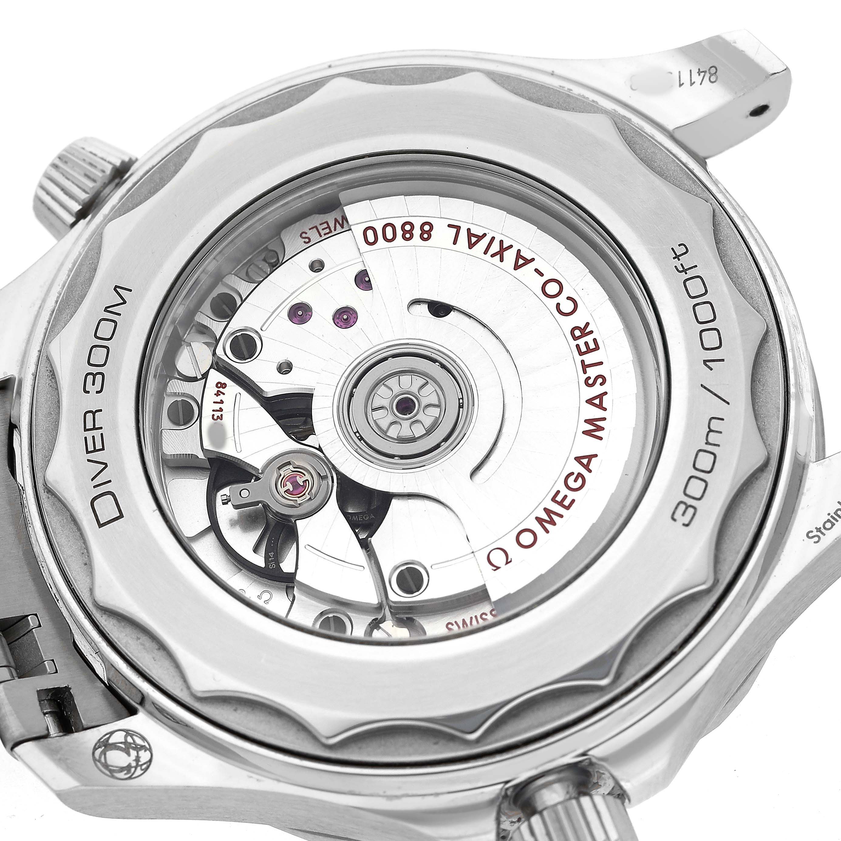 The image shows the back of the Omega Seamaster 210.30.42.20.10.001 Men's Stainless Steel Green Dial, highlighting its open case back and movement details.