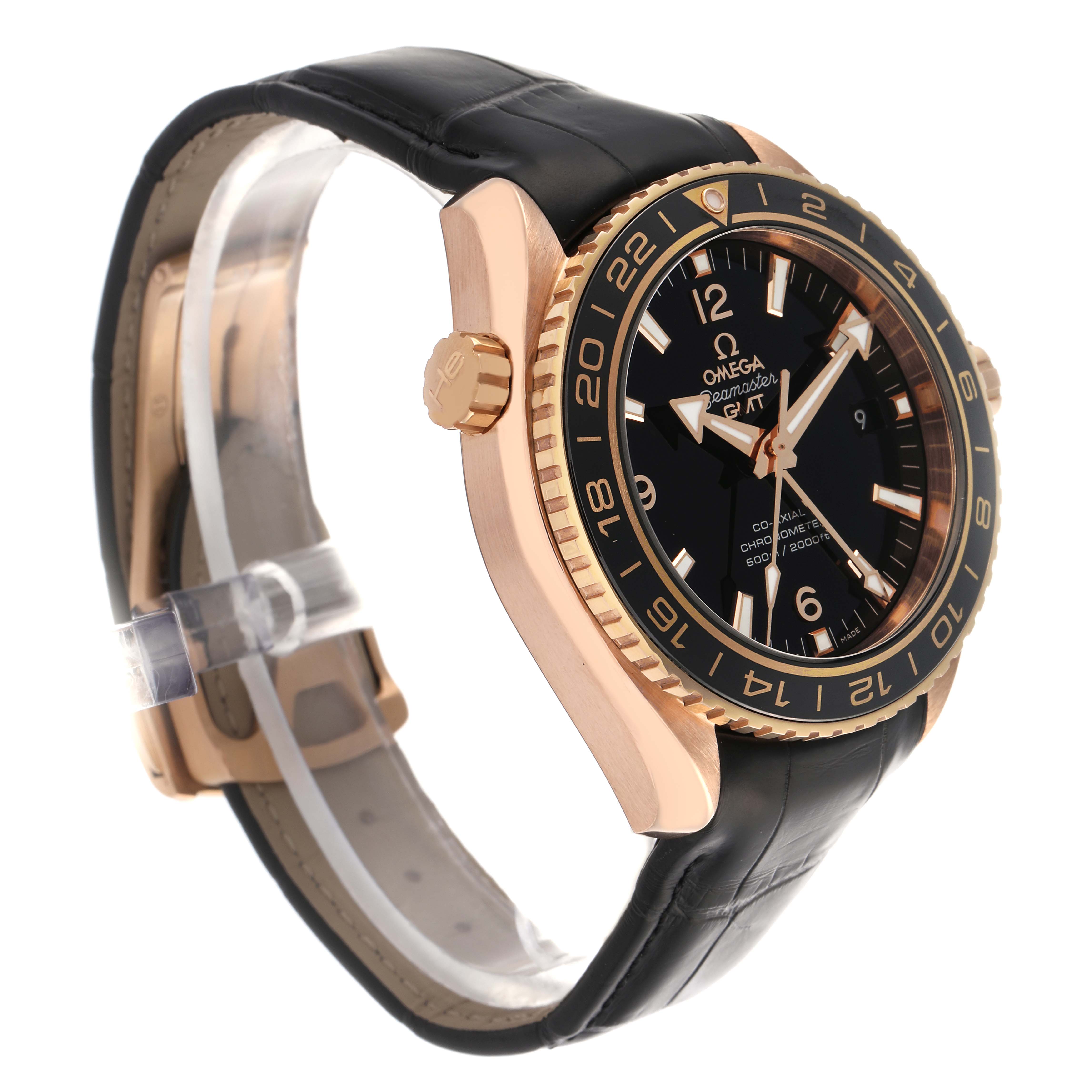 The Omega Planet Ocean 232.63.44.22.01.001 Men's Rose Gold Black Dial 232.63.44.22.01.001 Men's Rose Gold Black Dial watch is shown at a side angle, highlighting the bezel, crown, case, and leather strap.