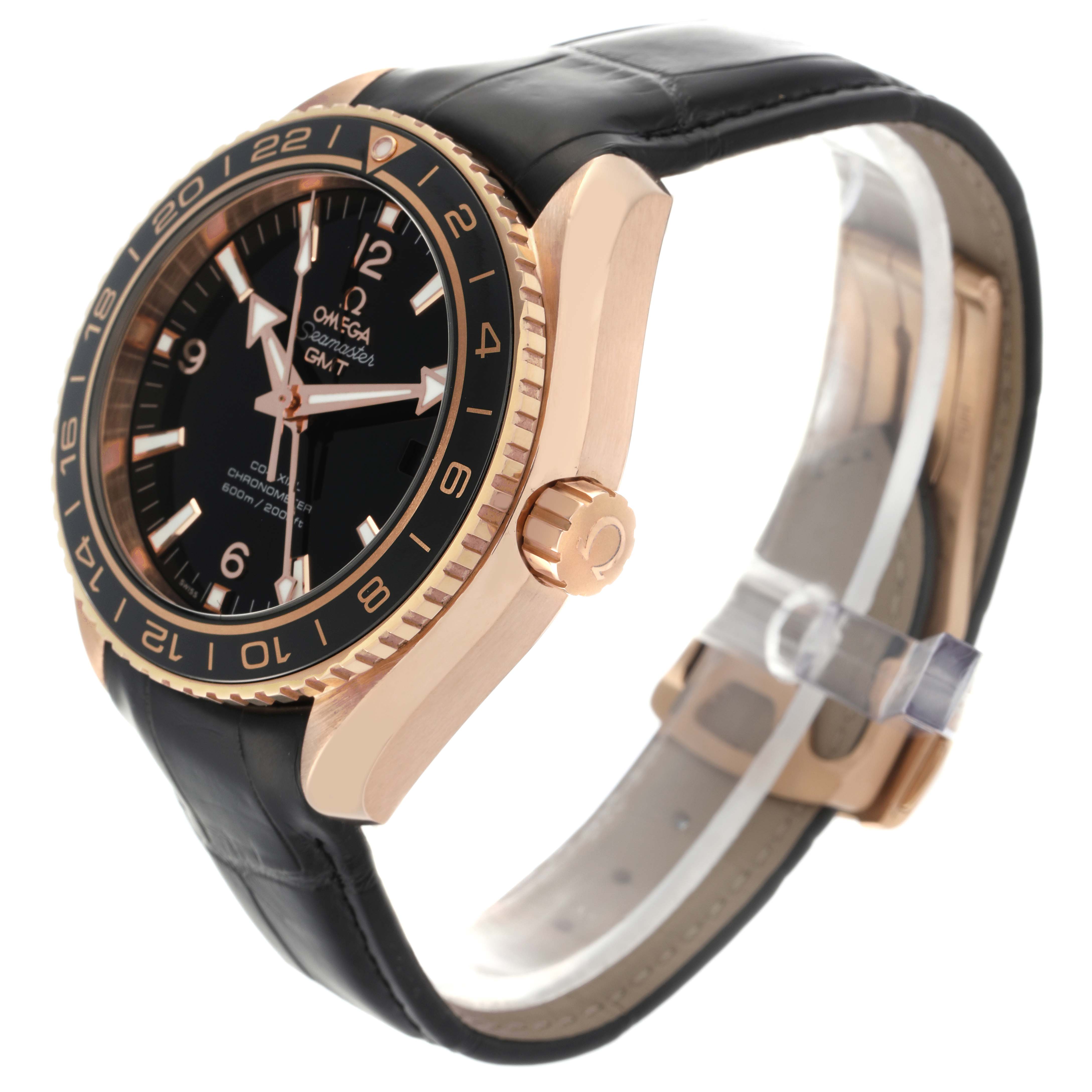 The image shows a side angle of the Omega Planet Ocean 232.63.44.22.01.001 Men's Rose Gold Black Dial 232.63.44.22.01.001 Men's Rose Gold Black Dial watch, showcasing the case, crown, bezel, and leather strap.