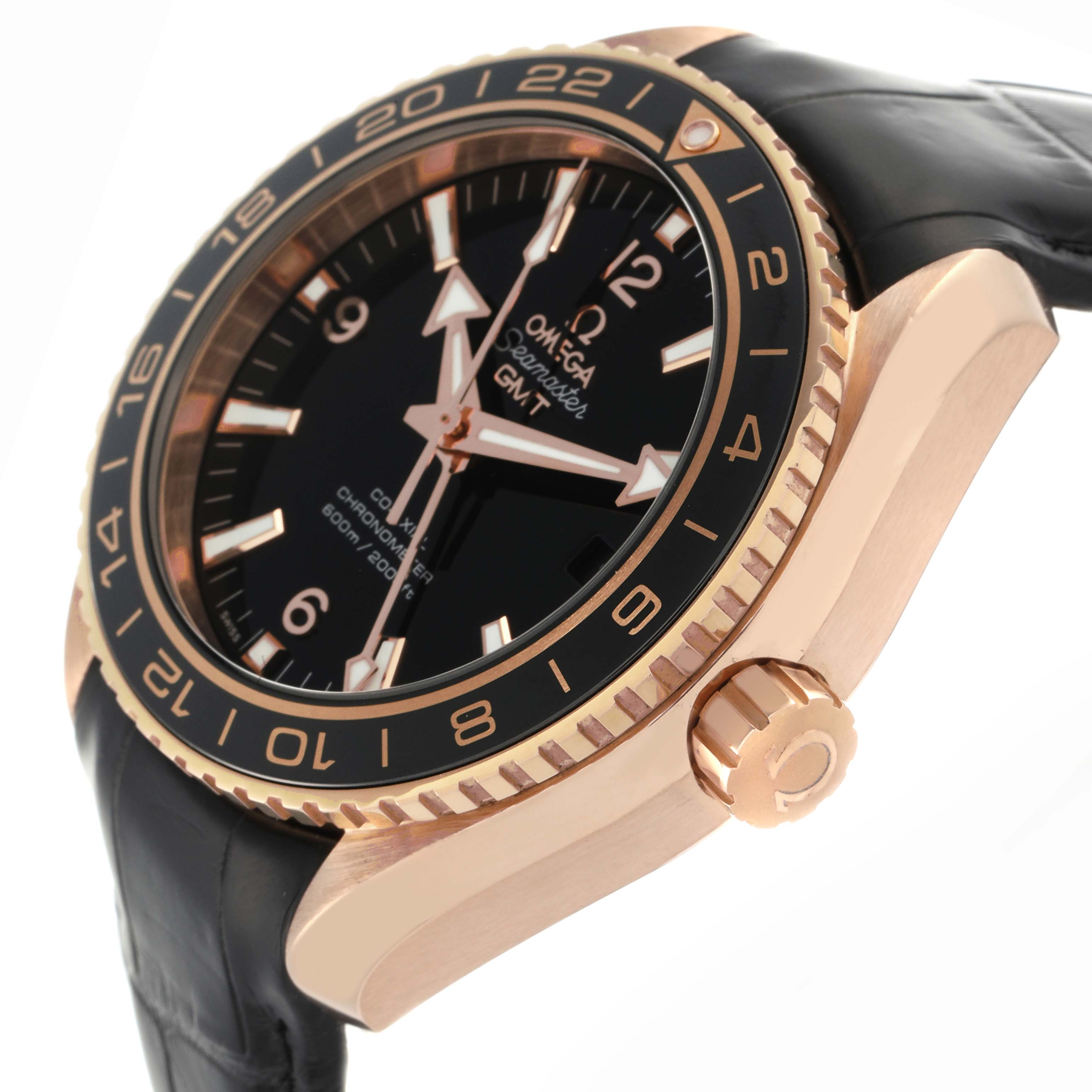 The image shows a side angle of an Omega Planet Ocean 232.63.44.22.01.001 Men's Rose Gold Black Dial 232.63.44.22.01.001 Men's Rose Gold Black Dial watch, highlighting the bezel, black dial, crown, and part of the strap.