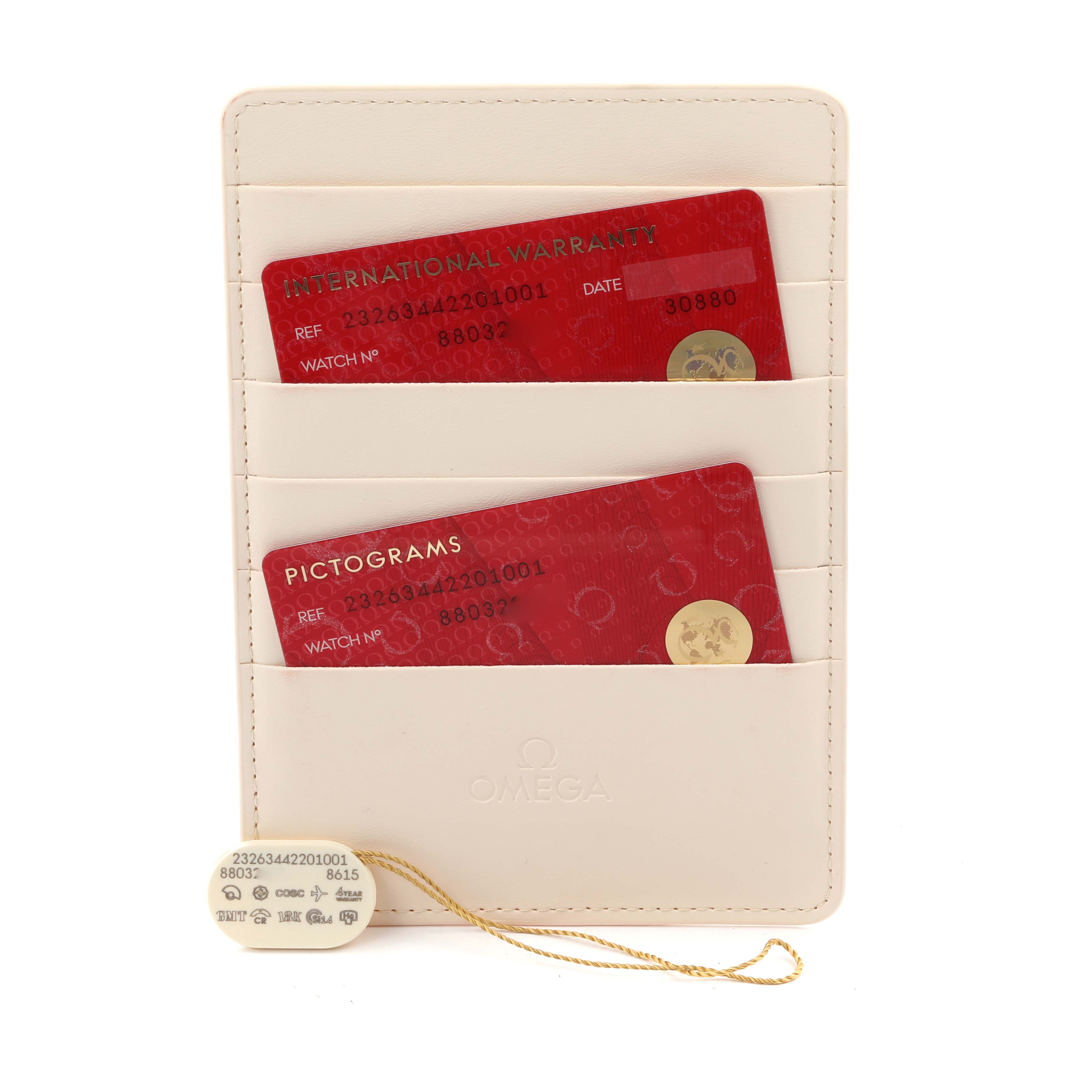 The image shows an Omega Planet Ocean 232.63.44.22.01.001 Men's Rose Gold Black Dial 232.63.44.22.01.001 Men's Rose Gold Black Dial watch's warranty card holder with two red cards and a white tag.