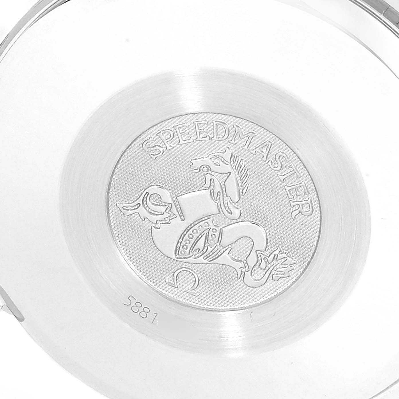 The image shows the back casing of an Omega Speedmaster 3520.50.00 Men
s Stainless Steel Black Dial 3520.50.00 Men
s Stainless Steel Black Dial watch, featuring an engraved emblem and serial number 5881.