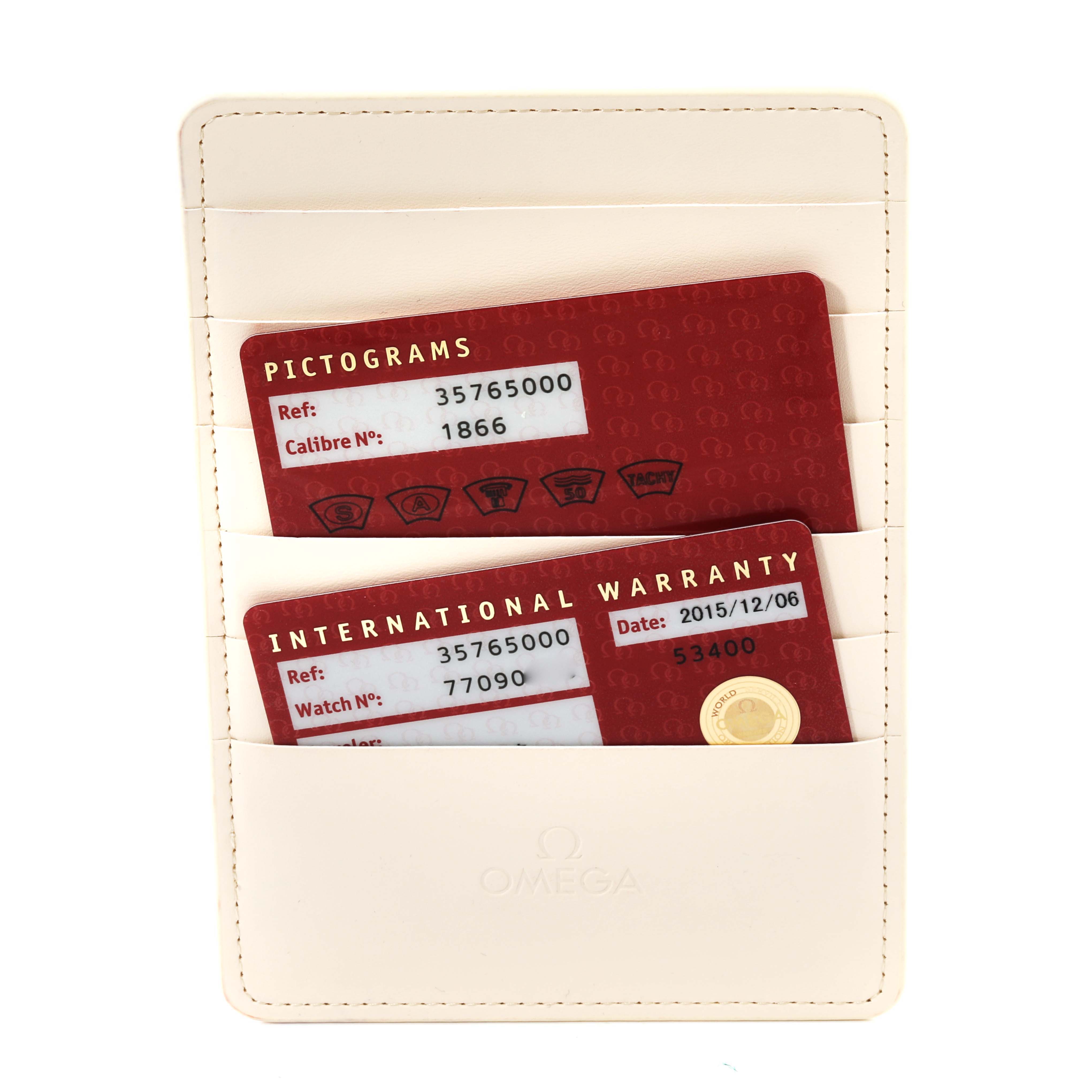 The image shows warranty and pictogram cards in a white holder for the Omega Speedmaster 3576.50.00 Men
s Stainless Steel Black Dial 3576.50.00 Men
s Stainless Steel Black Dial watch model.