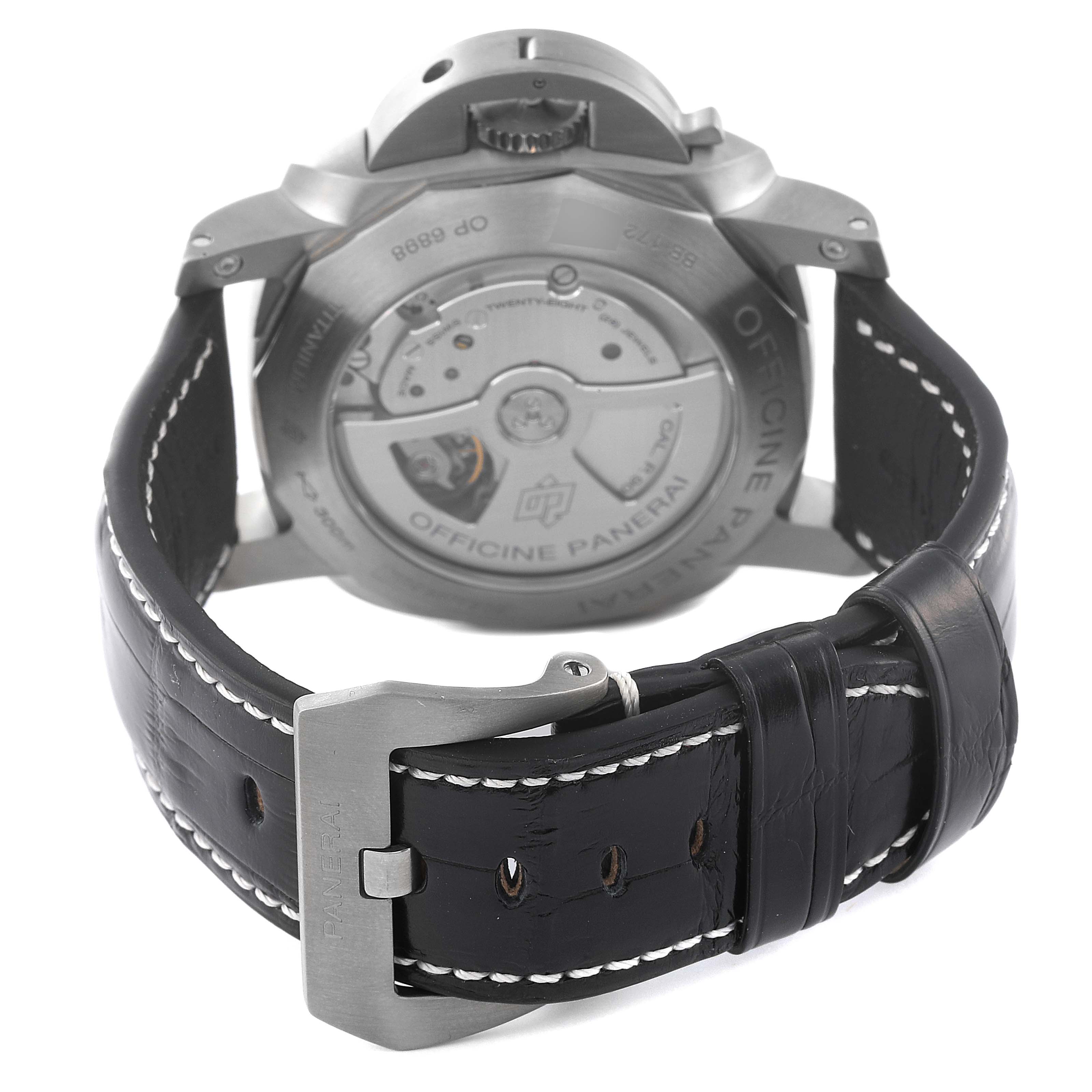 The image shows the back view of a Panerai Luminor PAM00351 Men's Titanium Brown Dial PAM00351 Men's Titanium Brown Dial watch, highlighting the movement and leather strap with buckle.