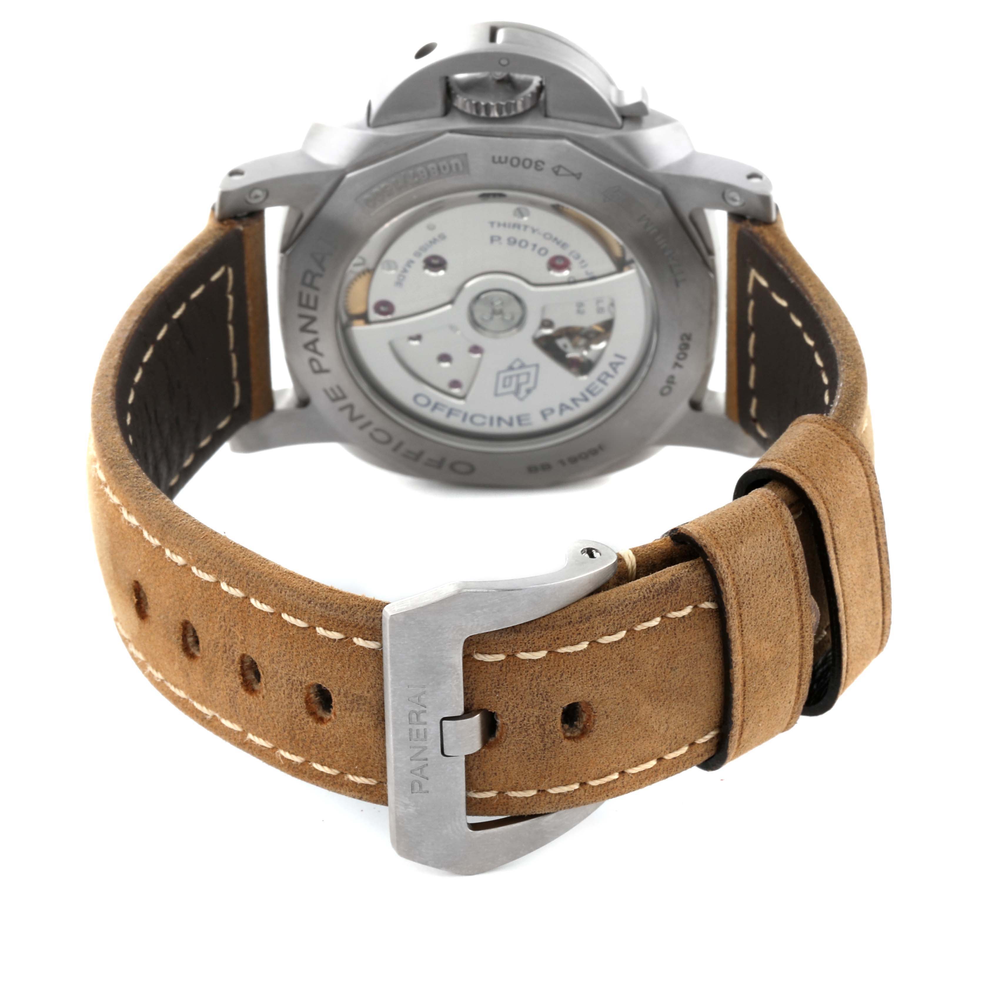 The image shows the back view of a Panerai Luminor PAM01351 Men
s Titanium Brown Dial PAM01351 Men
s Titanium Brown Dial watch displaying its case back, movement, and leather strap with buckle.