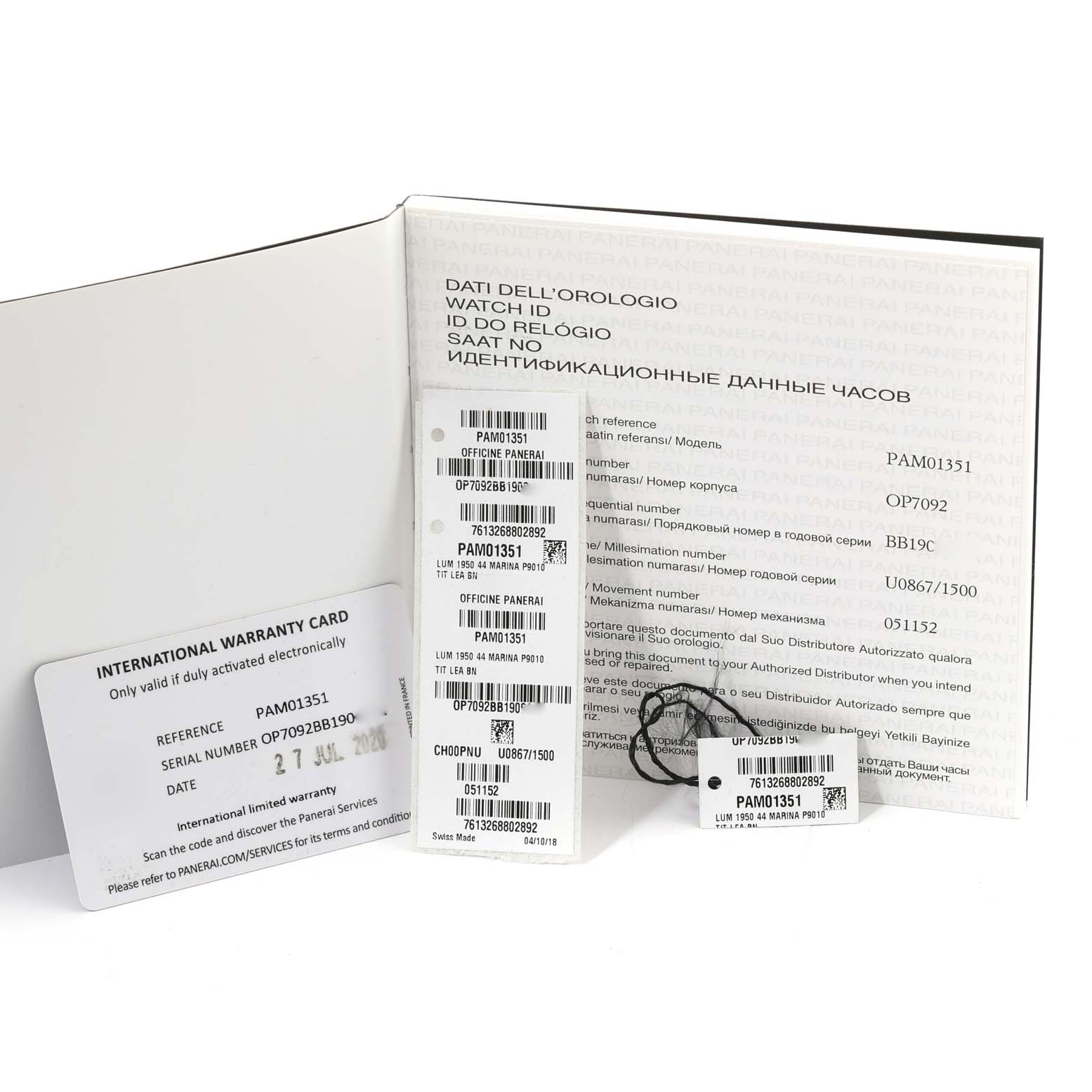 The image shows documents and accessories including the international warranty card and tags for the Panerai Luminor PAM01351 Men
s Titanium Brown Dial PAM01351 Men
s Titanium Brown Dial model PAM01351.