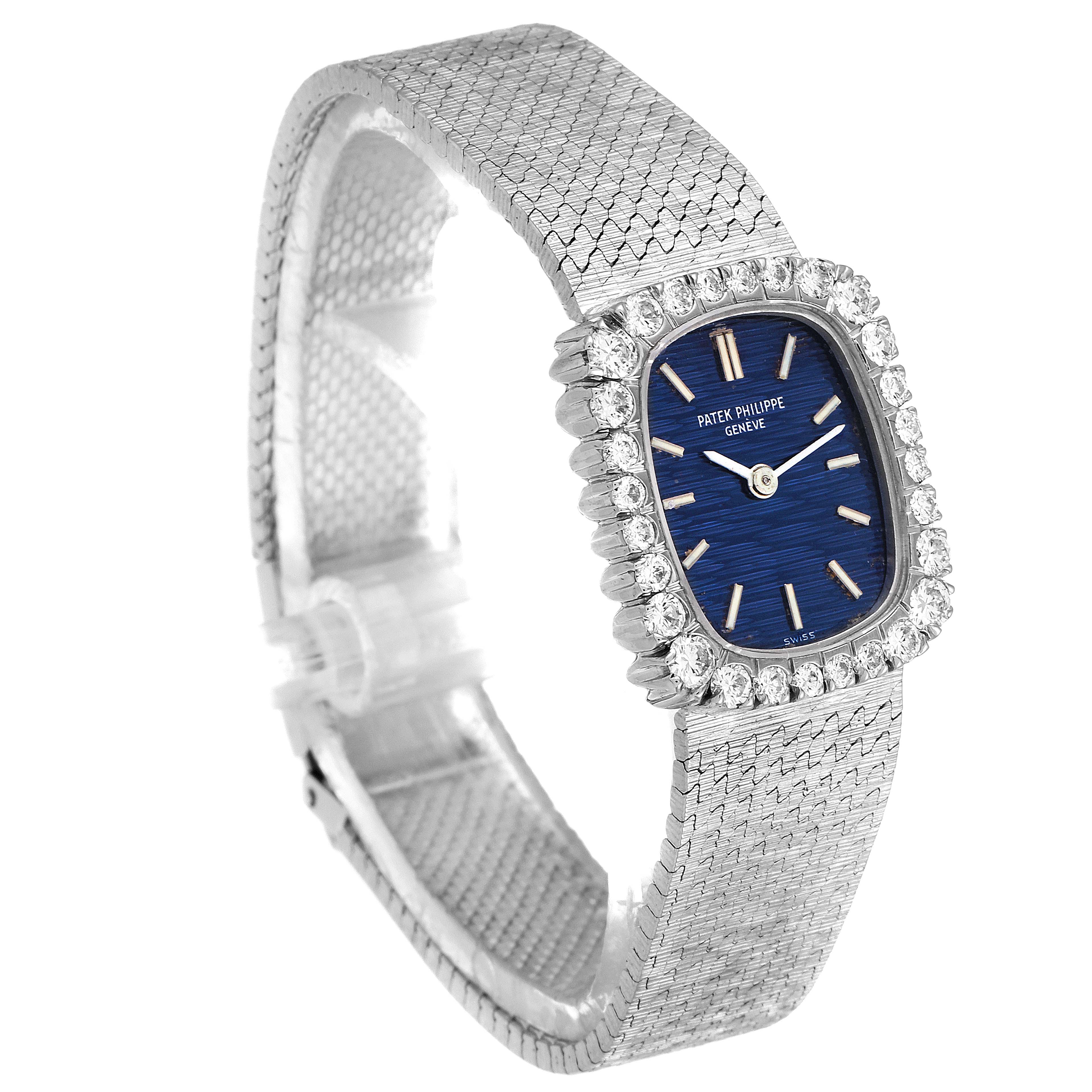 The image shows a Patek Philippe 4102 Women's White Gold Blue Dial 4102 Women's White Gold Blue Dial 4102 model watch at a side angle, highlighting its 18k white gold, diamond bezel, and blue dial.