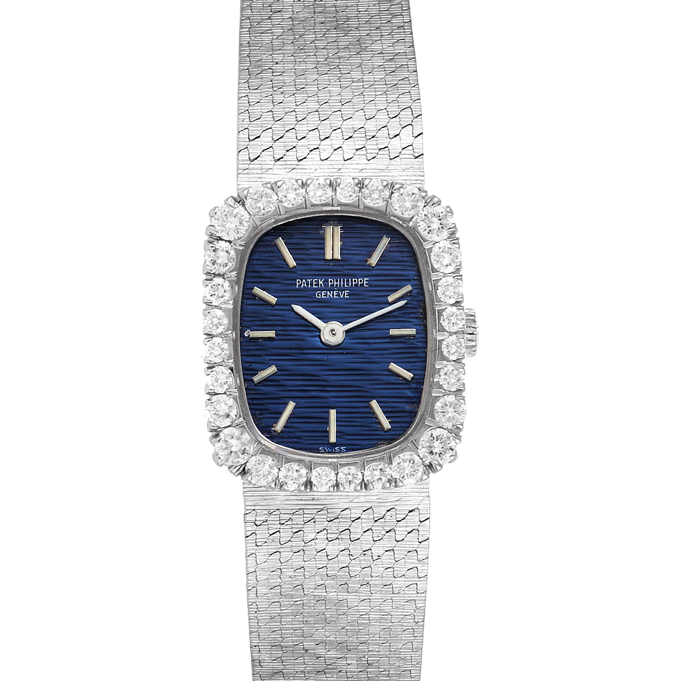 The Patek Philippe 4102 Women's White Gold Blue Dial 4102 Women's White Gold Blue Dial 4102 18k White Gold Diamond Bezel Cocktail Ladies Watch is shown from a front angle, highlighting the face and strap.