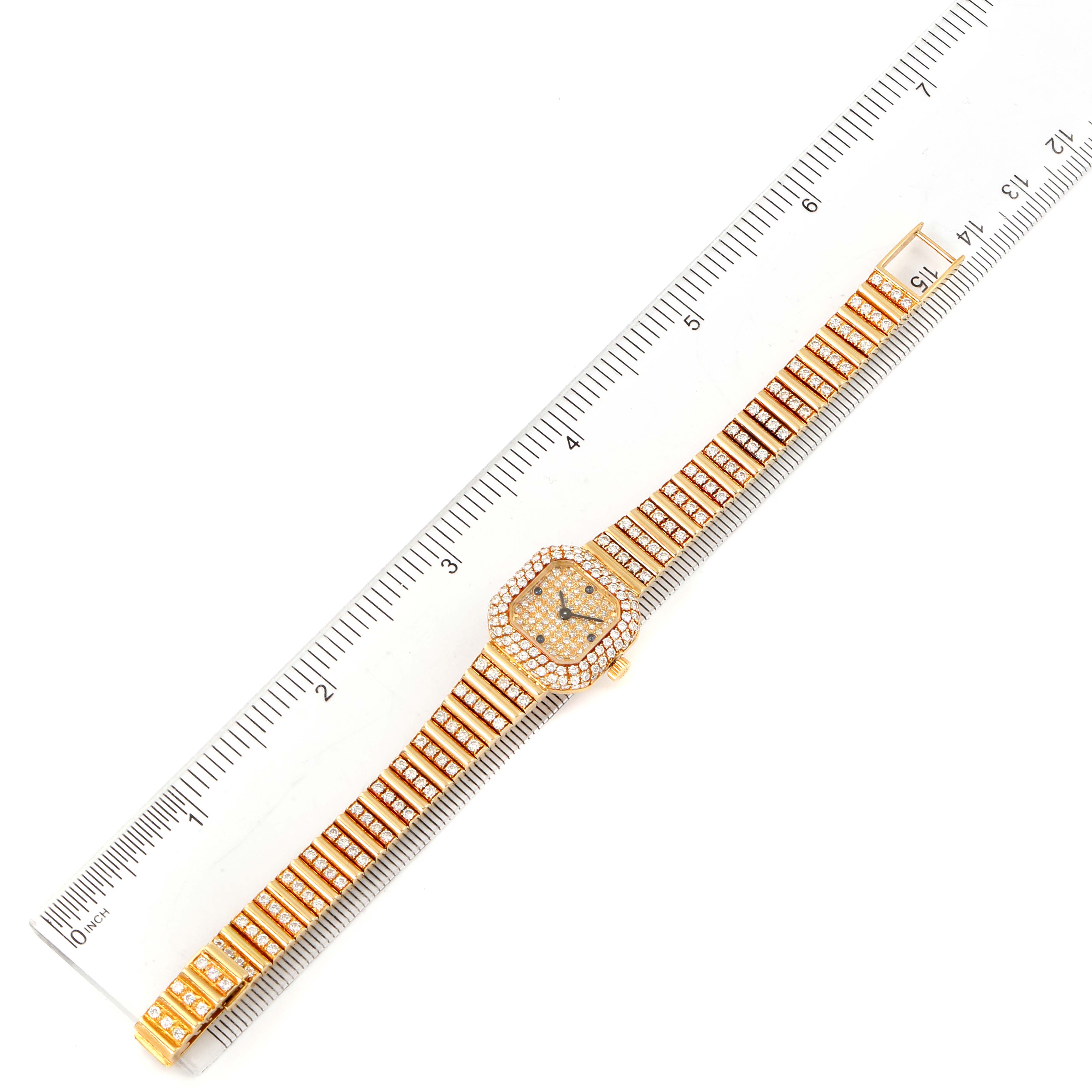 The image displays a top-down view of a Vintage Patek Philippe watch with a ruler for size reference.