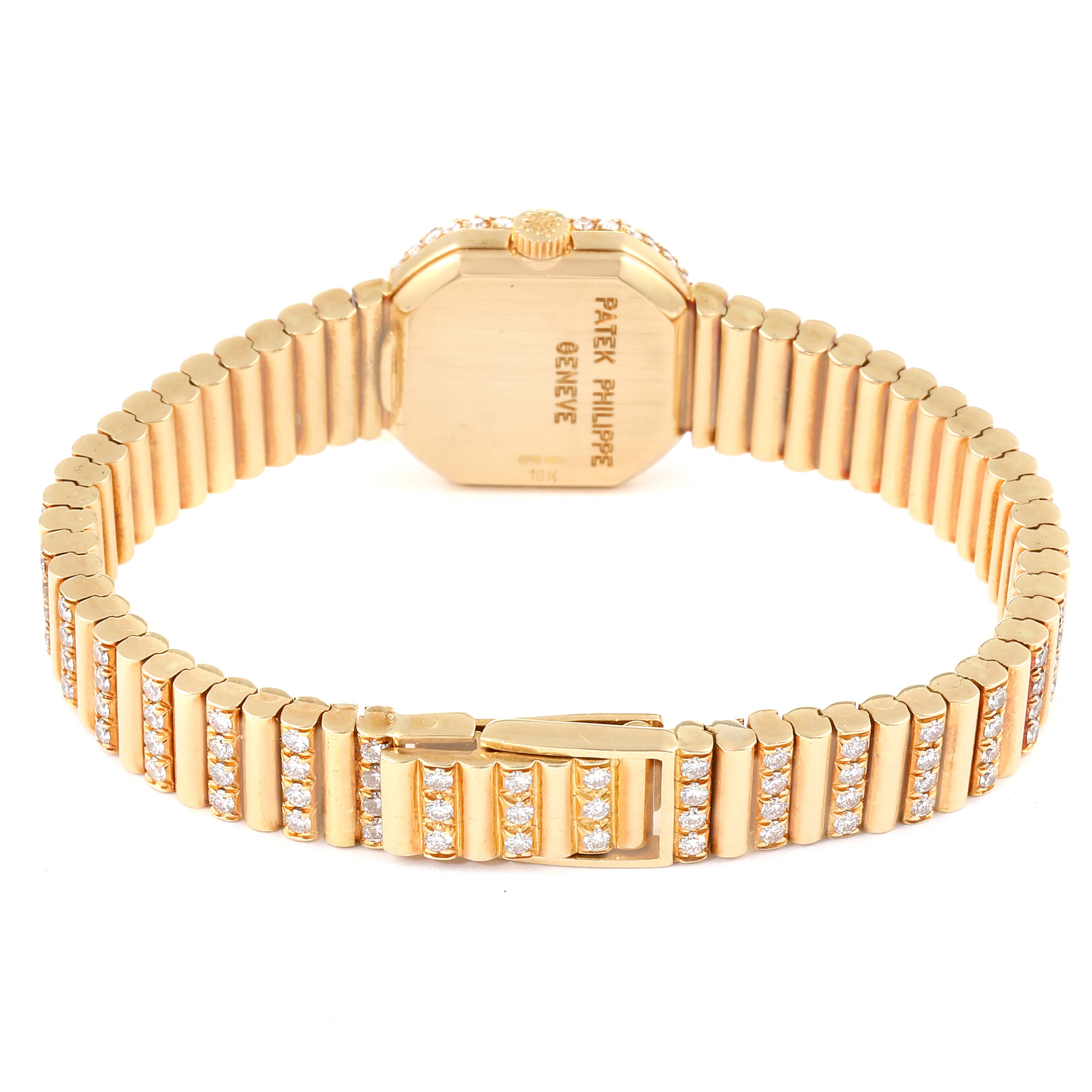 This image shows the back view of a Patek Philippe Vintage 4628/5 Women's Yellow Gold  4628/5 Women's Yellow Gold  watch, highlighting its gold bracelet and clasp.