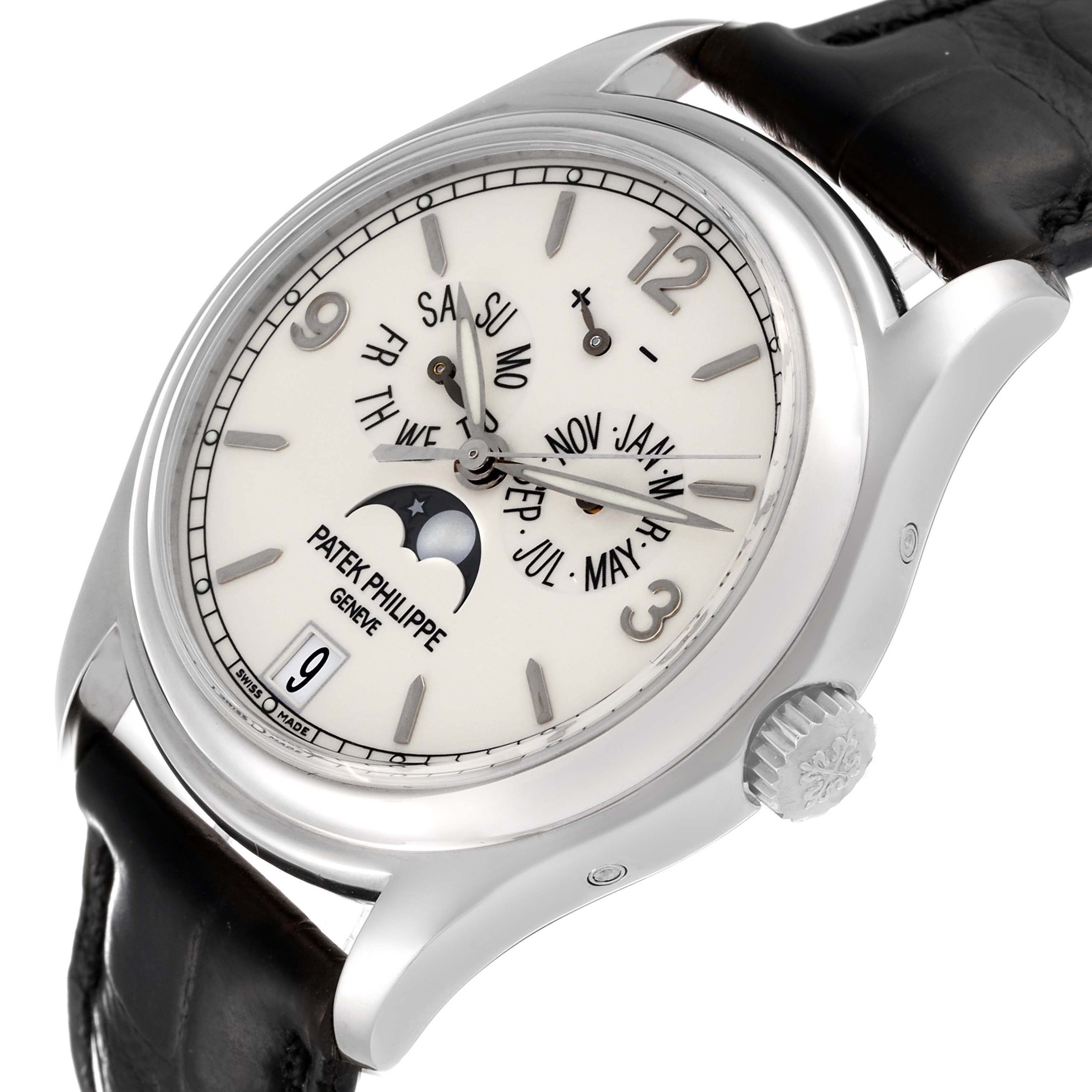 This image shows a Patek Philippe Complications 5146G Men's White Gold Beige Dial 5146G Men's White Gold Beige Dial watch at an angled side view, highlighting the face, bezel, crown, and part of the strap.
