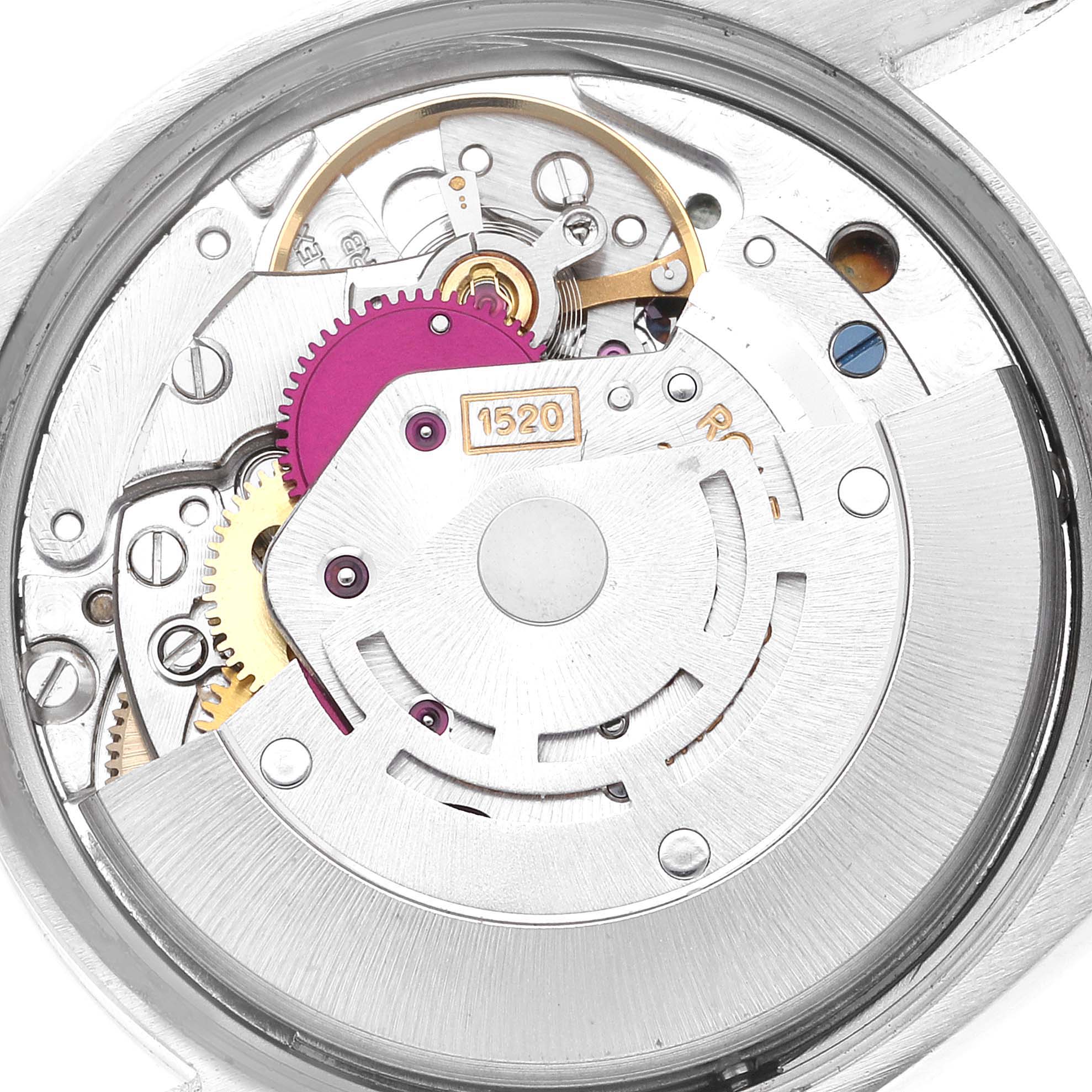 This is a close-up shot of the internal movement parts of a Rolex Vintage Collection 5500 Men's Stainless Steel Silver Dial 5500 Men's Stainless Steel Silver Dial model watch, showing gears and the rotor.