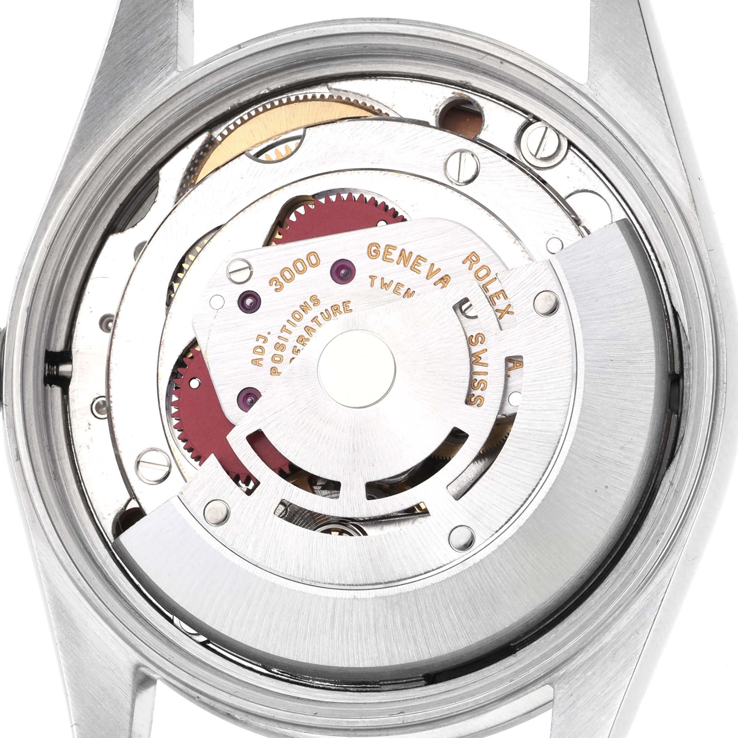 The Rolex Air-King 14000 Men's Stainless Steel Pink Dial 14000 Men's Stainless Steel Pink Dial watch is shown from the back, highlighting its intricate movement and rotor.