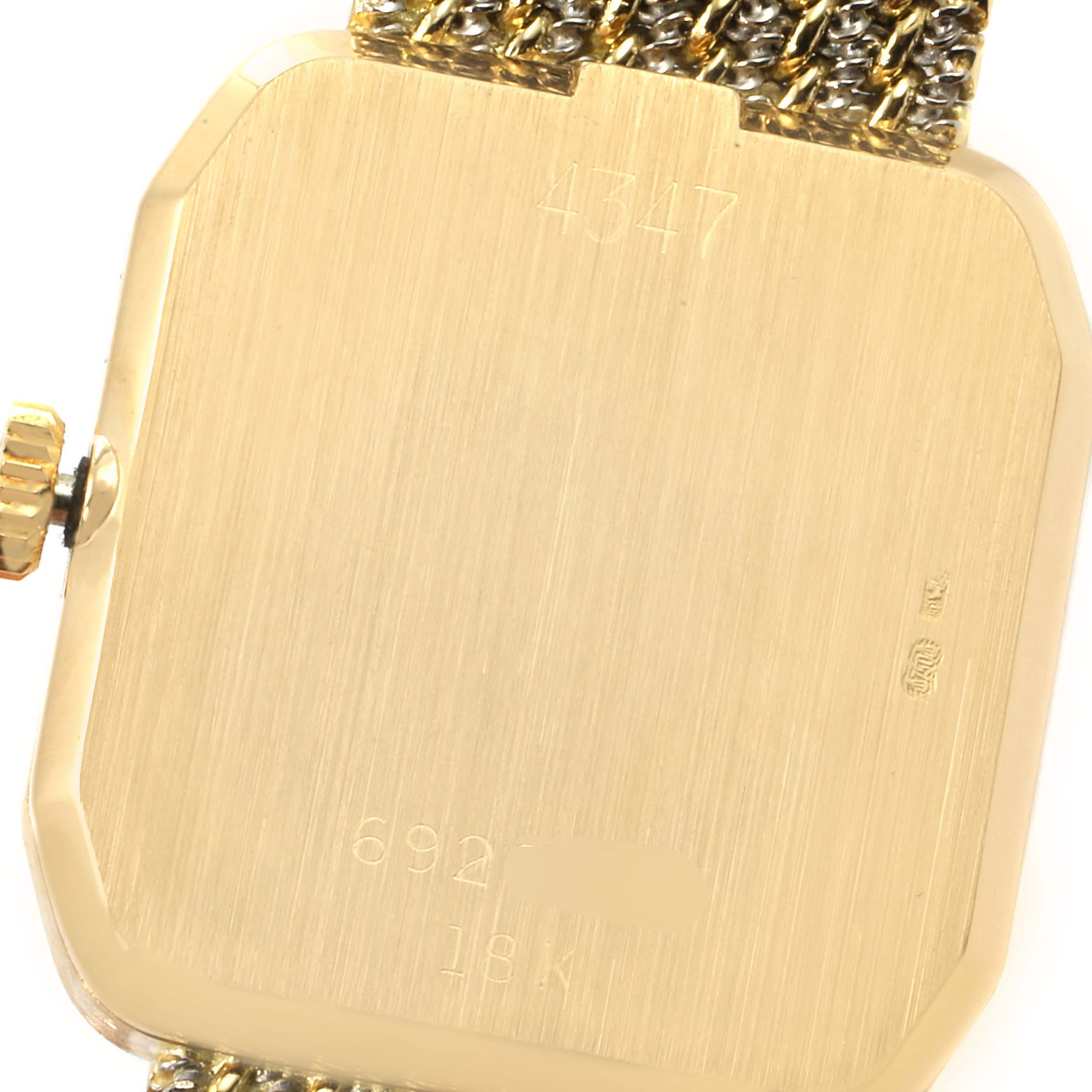 The image shows the case back and crown of a Rolex Cellini 4347 Women's Yellow Gold Champagne Dial 4347 Women's Yellow Gold Champagne Dial watch, featuring a gold finish with engraved markings.