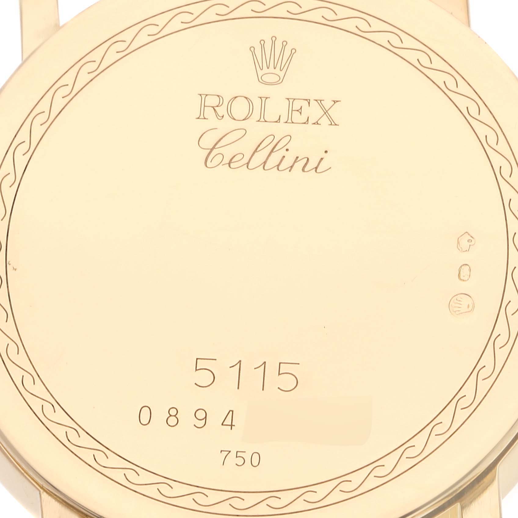 The image shows the back case of a Rolex Cellini 5115 Men
s Yellow Gold Mother of Pearl Dial 5115 Men
s Yellow Gold Mother of Pearl Dial watch, featuring branding and model details.