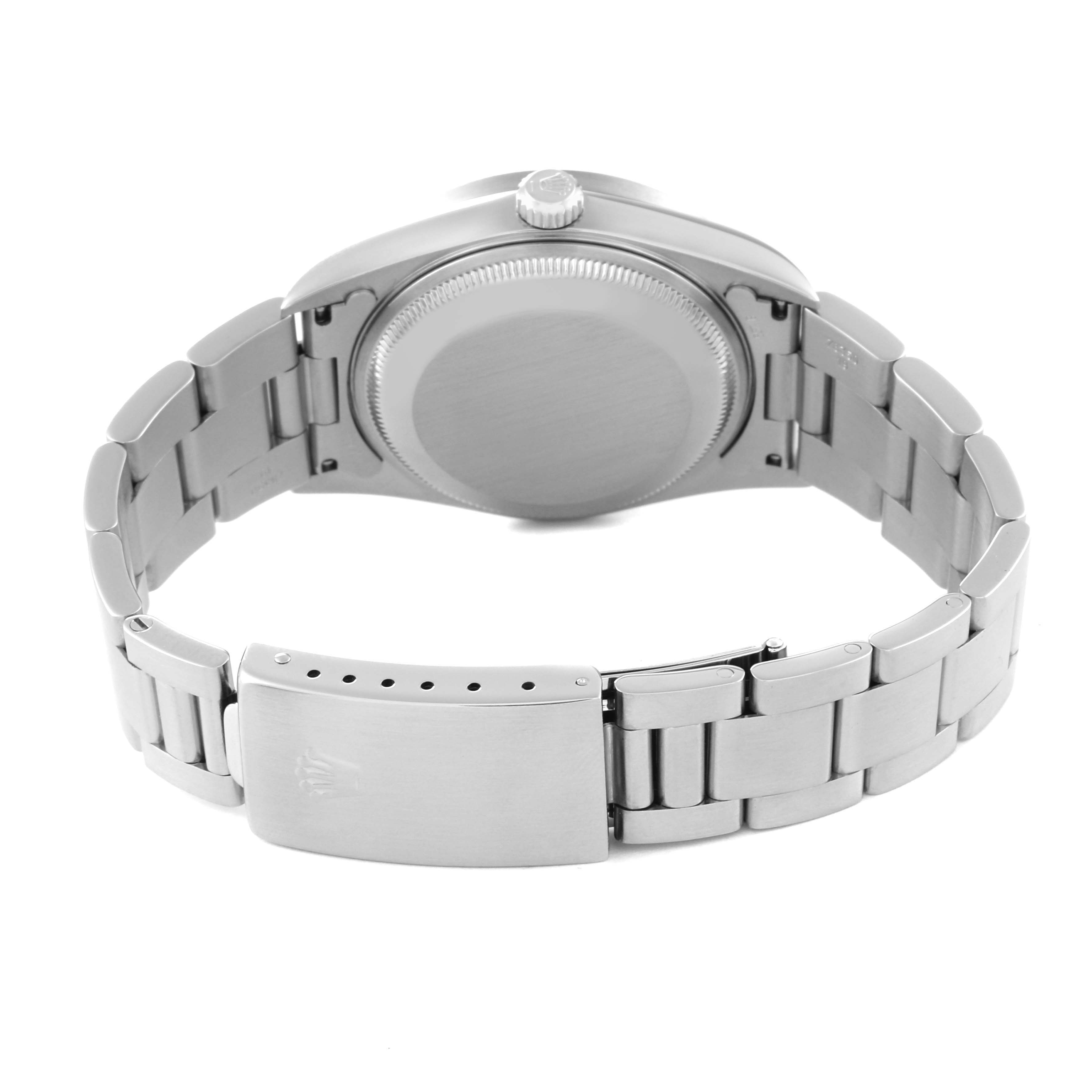 The image shows the back of the Rolex Date 15210 Men's Stainless Steel Blue Dial 15210 Men's Stainless Steel Blue Dial model watch, including the case back and bracelet with the closed clasp.