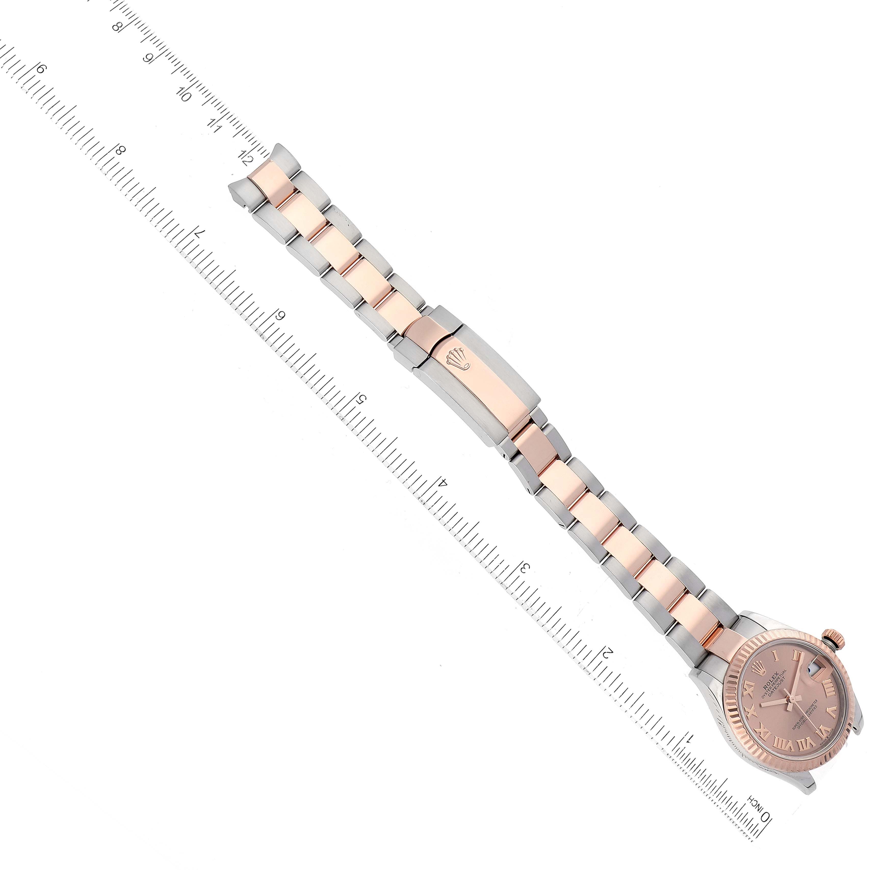 The image shows a Top-Down view of a Mid-Size Rolex watch with a two-tone bracelet and ruler for scale.