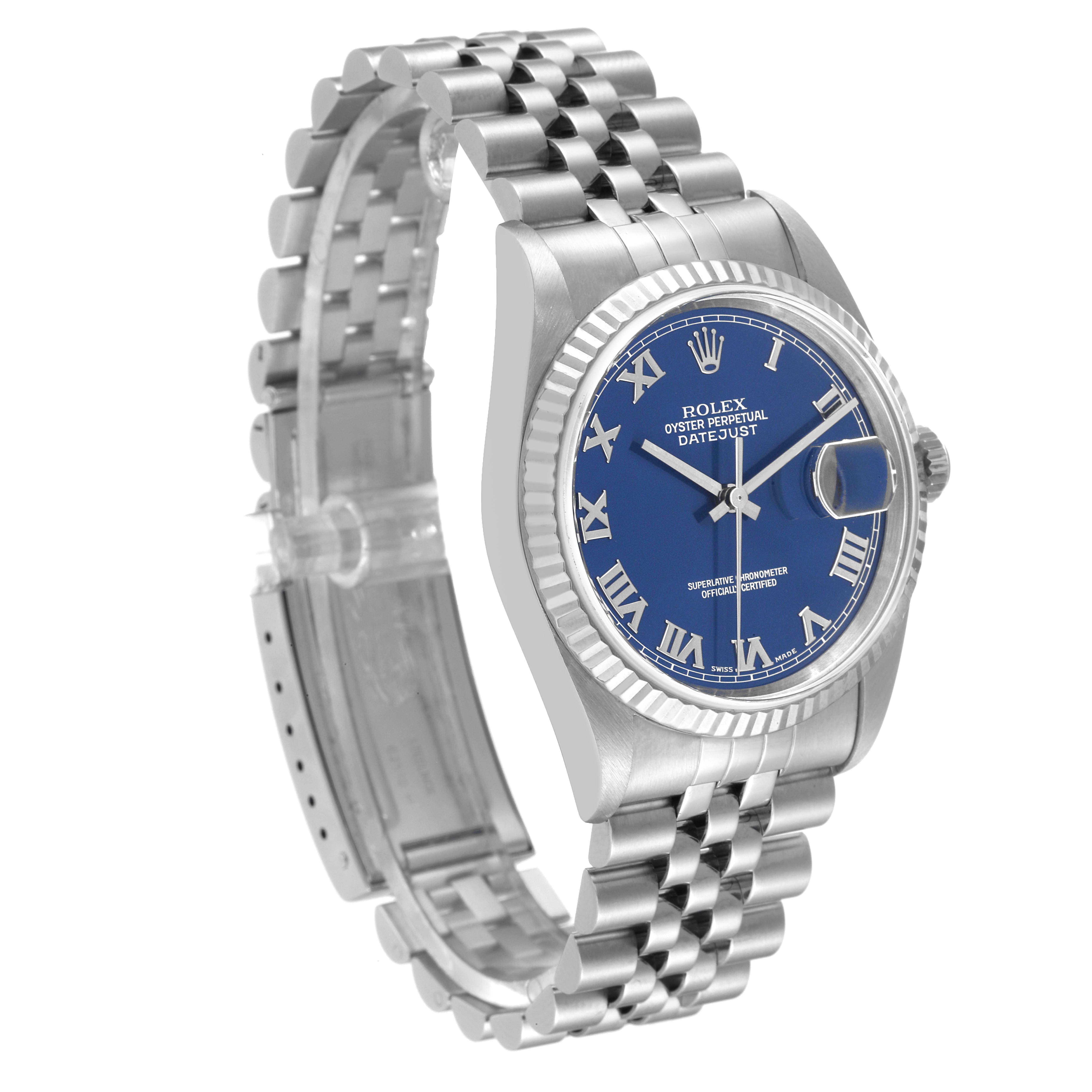 The Rolex Datejust 16234 Men's Stainless Steel Blue Dial 16234 Men's Stainless Steel Blue Dial watch is shown at an angle highlighting its blue dial, date window, fluted bezel, and Jubilee bracelet.