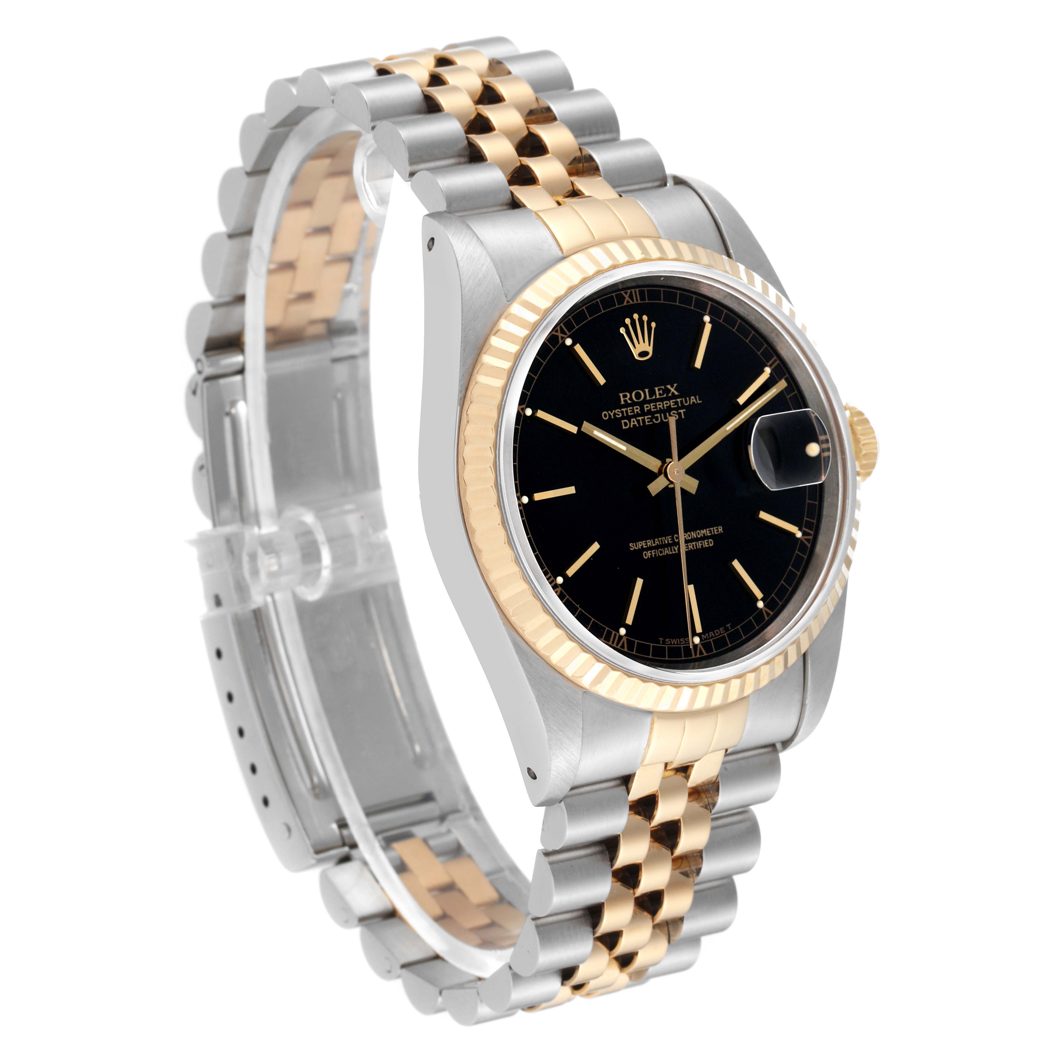 The image shows a Rolex Datejust 16233 Men's Steel and Gold (two tone) Black Dial 16233 Men's Steel and Gold (two tone) Black Dial watch angled to display its black dial, two-tone bracelet, fluted bezel, and crown.