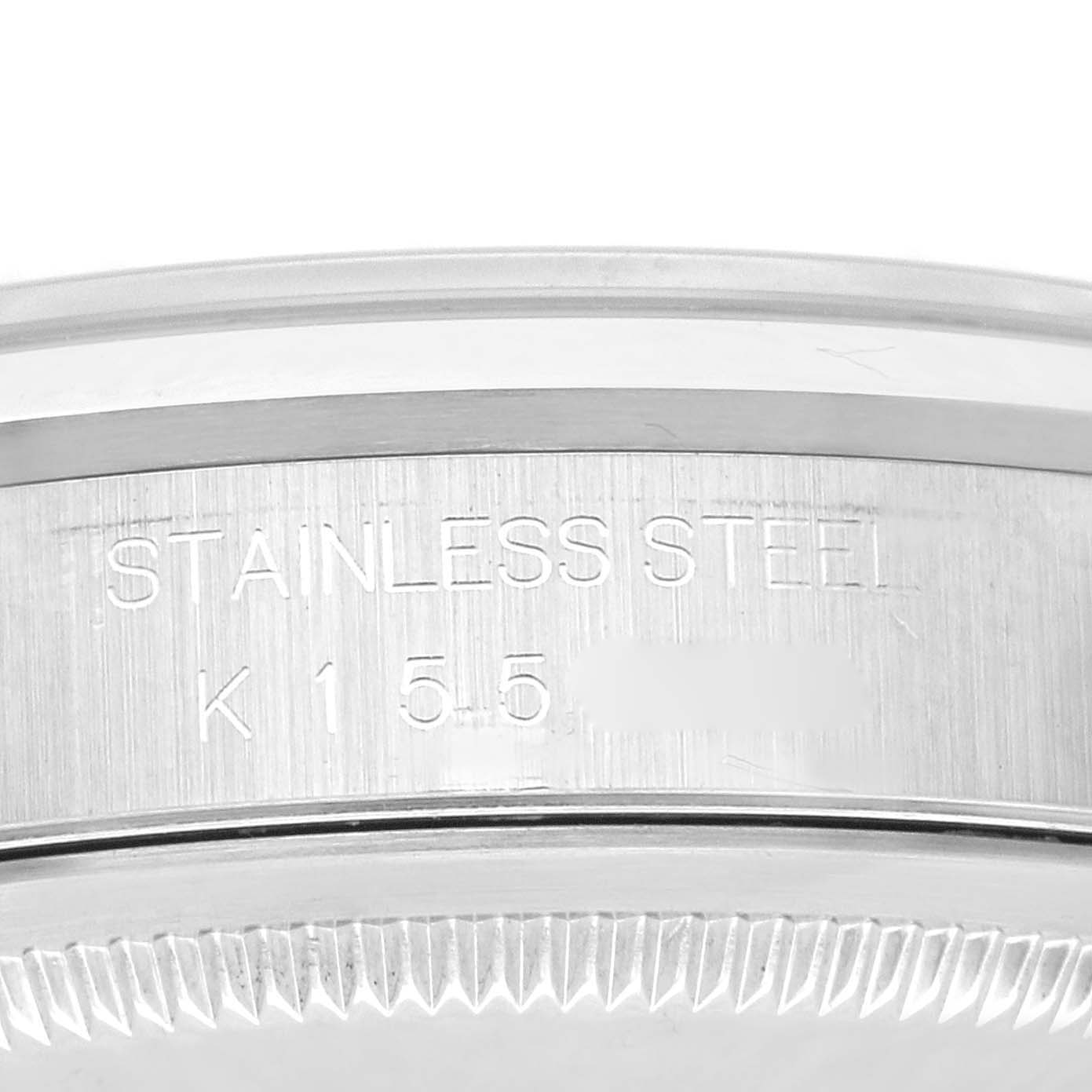 This image shows the side of a Rolex Datejust 16200 Men's Stainless Steel Black Dial 16200 Men's Stainless Steel Black Dial watch case with focus on the engraved text indicating it is made of stainless steel.