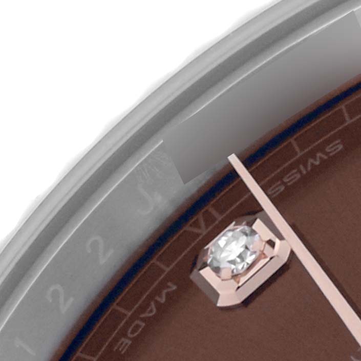 The image shows a close-up of the Rolex Datejust 41 126331 Men
s Steel and Gold (two tone) Brown Dial 126331 Men
s Steel and Gold (two tone) Brown Dial watch face, highlighting the bezel, dial, diamond hour marker, and part of the hand.