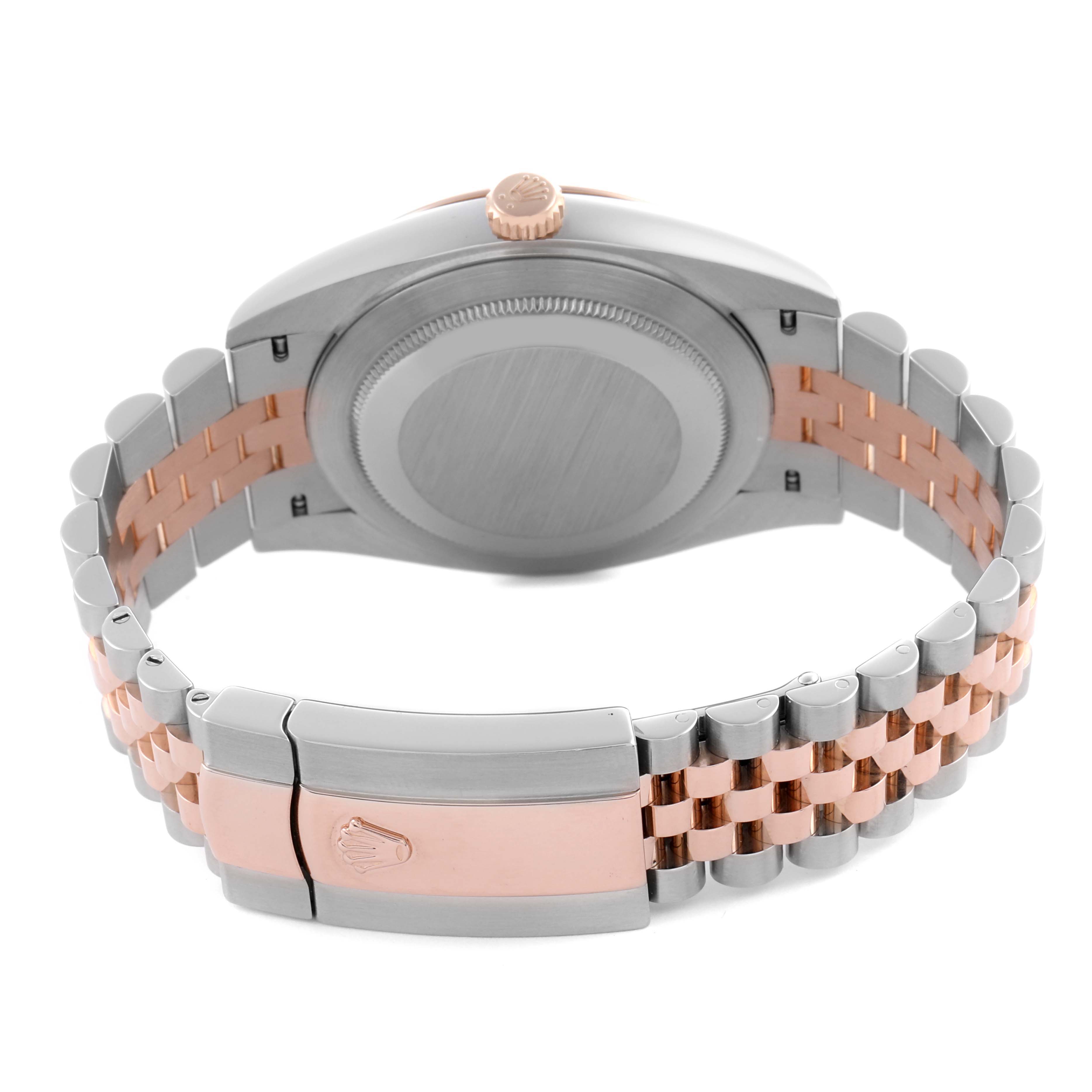 The image shows the back and clasp of a Rolex Datejust 41 126331 Men
s Steel and Gold (two tone) Brown Dial 126331 Men
s Steel and Gold (two tone) Brown Dial, highlighting the two-tone bracelet and case back.