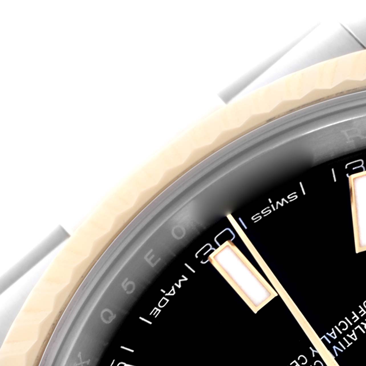 The image shows a close-up of the bezel and part of the dial of a Rolex Datejust 41 126333 Men's Steel and Gold (two tone) Black Dial 126333 Men's Steel and Gold (two tone) Black Dial, highlighting the hour markers and numerals.
