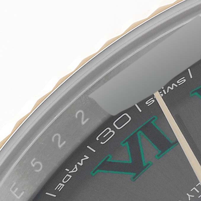 The image shows a close-up of the dial and bezel edge of a Rolex Datejust 41 126333 Men's Steel and Gold (two tone) Grey Dial, highlighting the Roman numerals and minute markers.