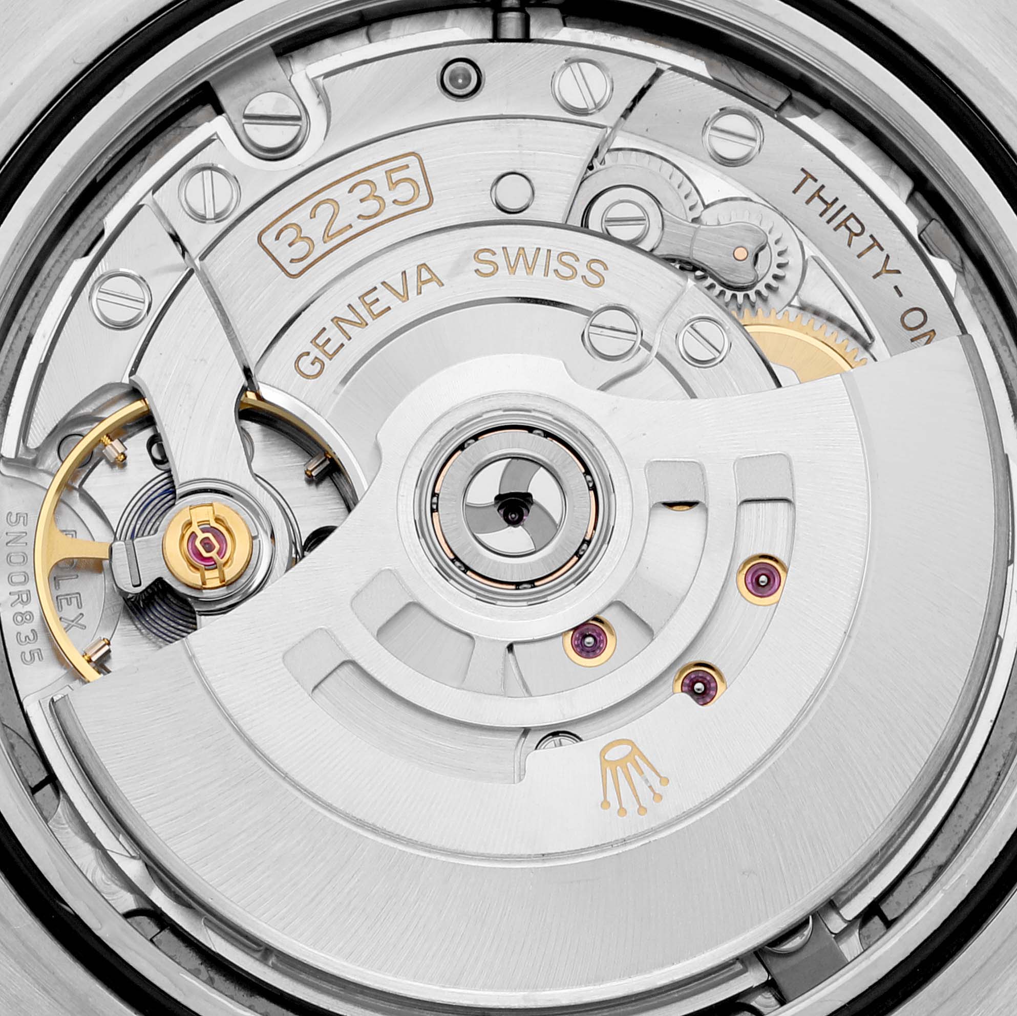 The image shows a close-up view of the movement and internal mechanisms of a Rolex Datejust 41 126333 Men's Steel and Gold (two tone) Grey Dial 126333 Men's Steel and Gold (two tone) Grey Dial model.