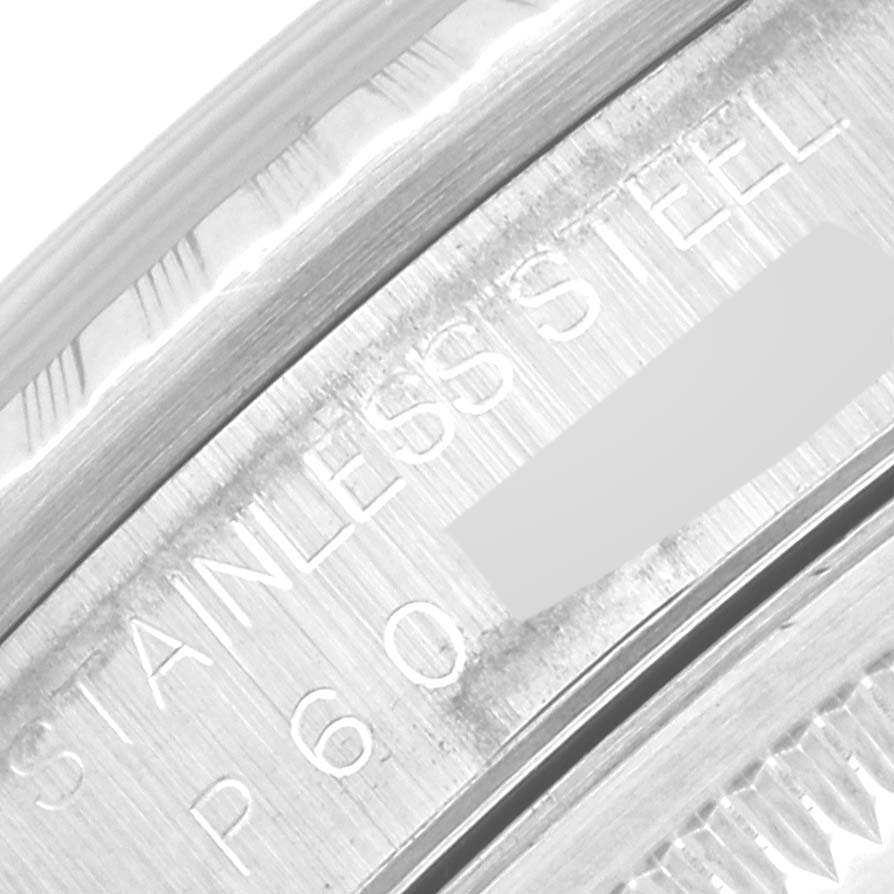 This image shows a close-up of the stainless steel casing of the Rolex Datejust 16220 Men's Stainless Steel Blue Dial 16220 Men's Stainless Steel Blue Dial watch.