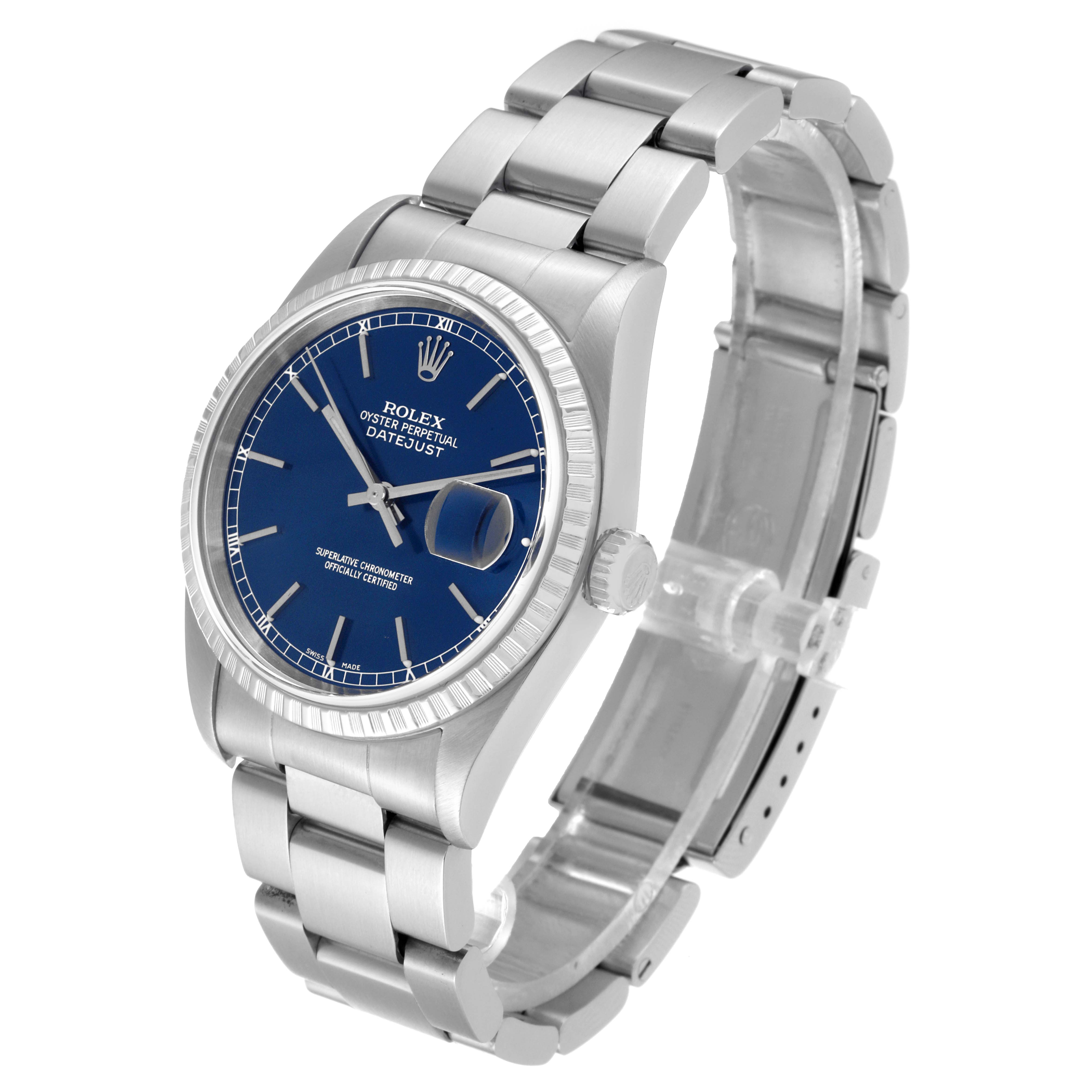 The image shows a Rolex Datejust 16220 Men's Stainless Steel Blue Dial 16220 Men's Stainless Steel Blue Dial watch at an oblique angle, highlighting its blue dial, fluted bezel, and stainless steel bracelet.