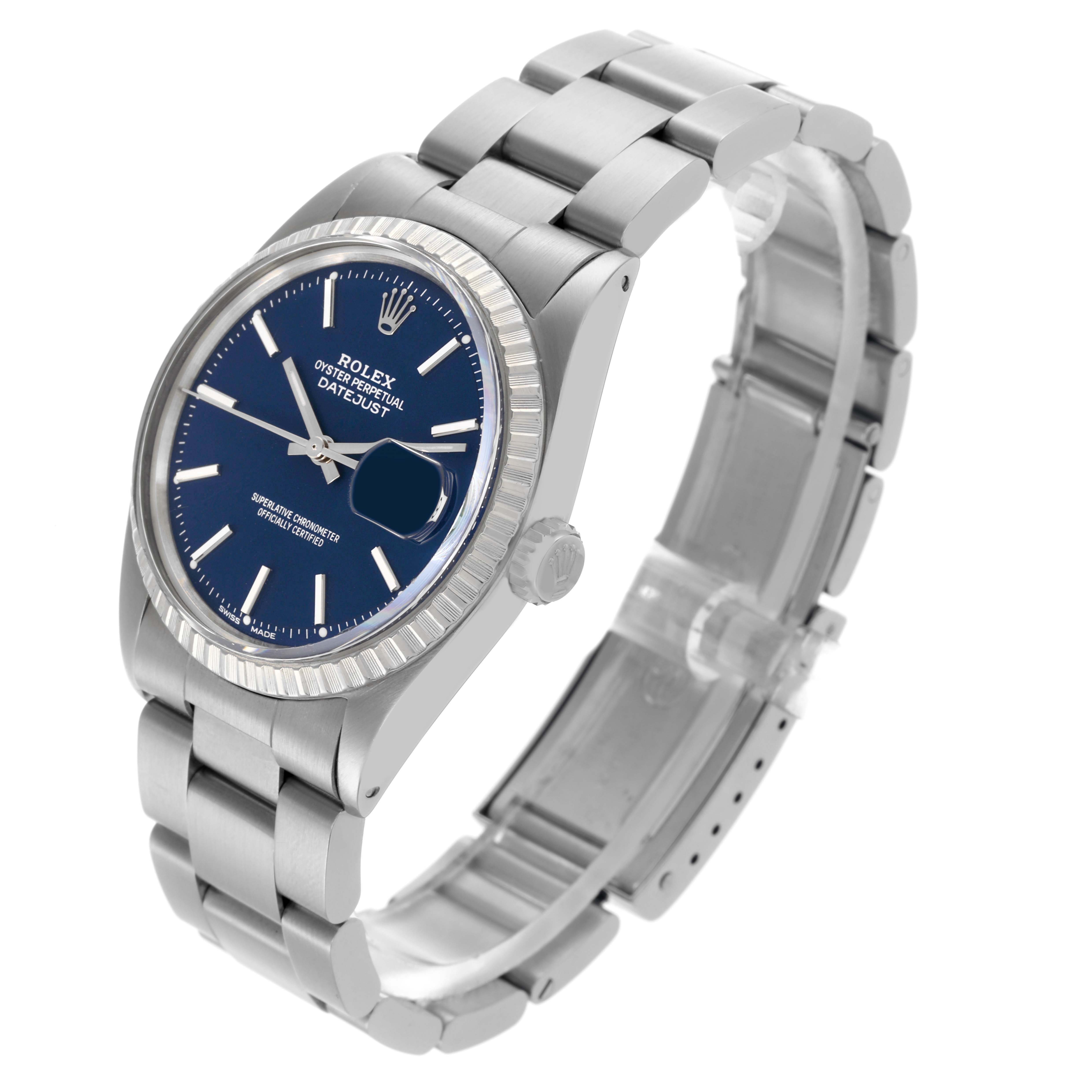 The Rolex Datejust 1603 Men's Stainless Steel Blue Dial 1603 Men's Stainless Steel Blue Dial watch is shown from an angle displaying the face, bezel, and bracelet prominently.